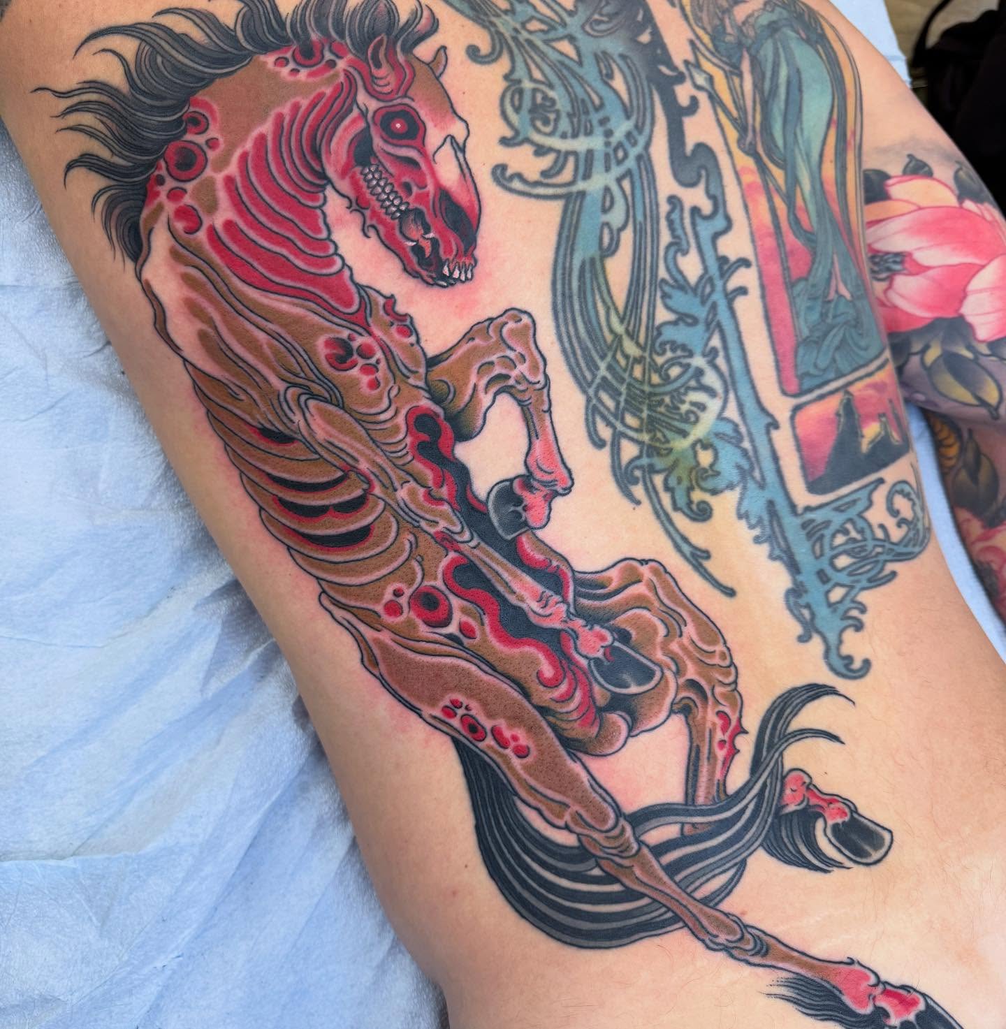 Galloping horse American traditional tattoo on the thigh by Derek Noble, San Francisco, California