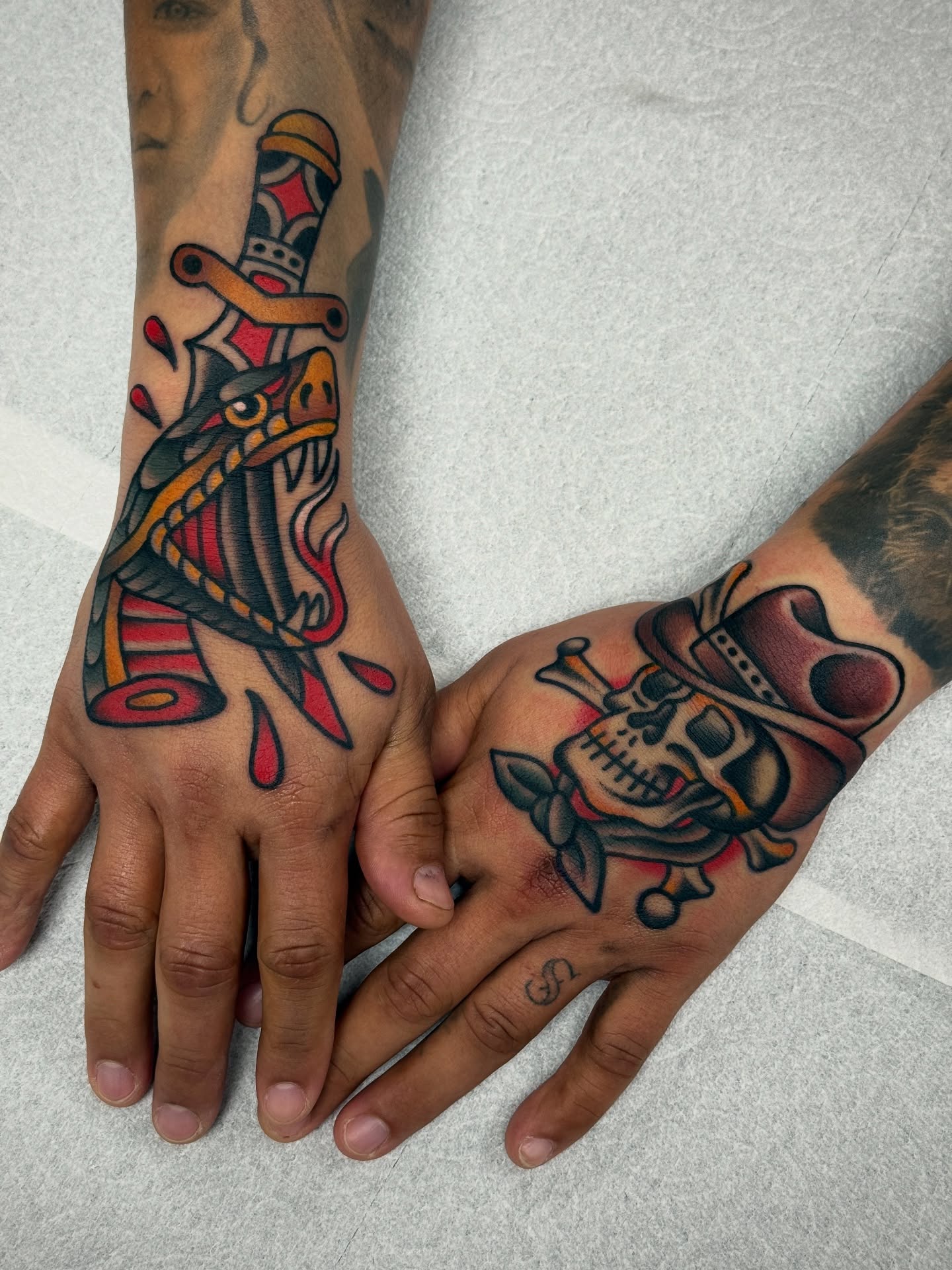 Skull and cowboy hat American traditional tattoo on the forearm by Jordan Allen
