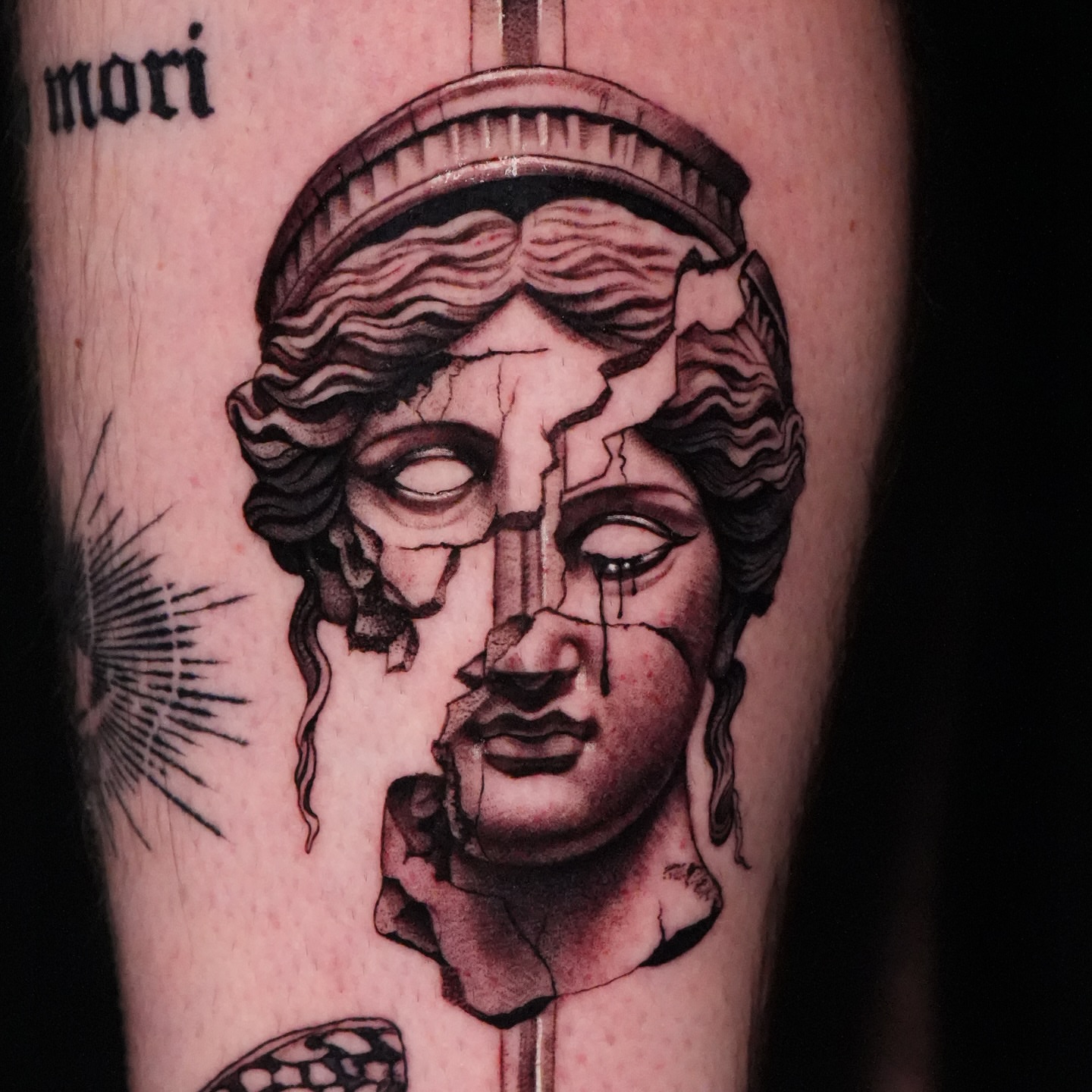 Broken statue black and grey tattoo on the forearm by Jesse Reip, Lakewood, Ohio