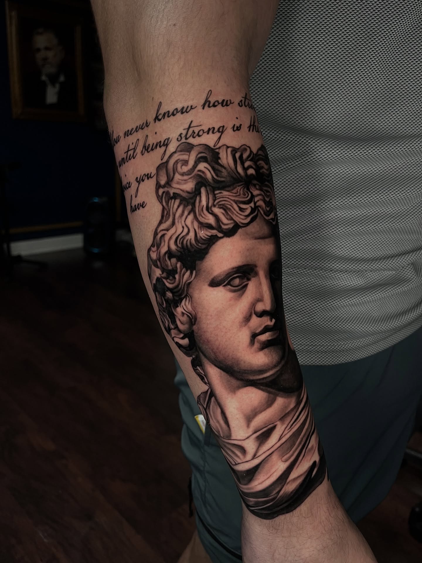 Statue head realism tattoo on the forearm by Angie Morales, Laredo, Texas