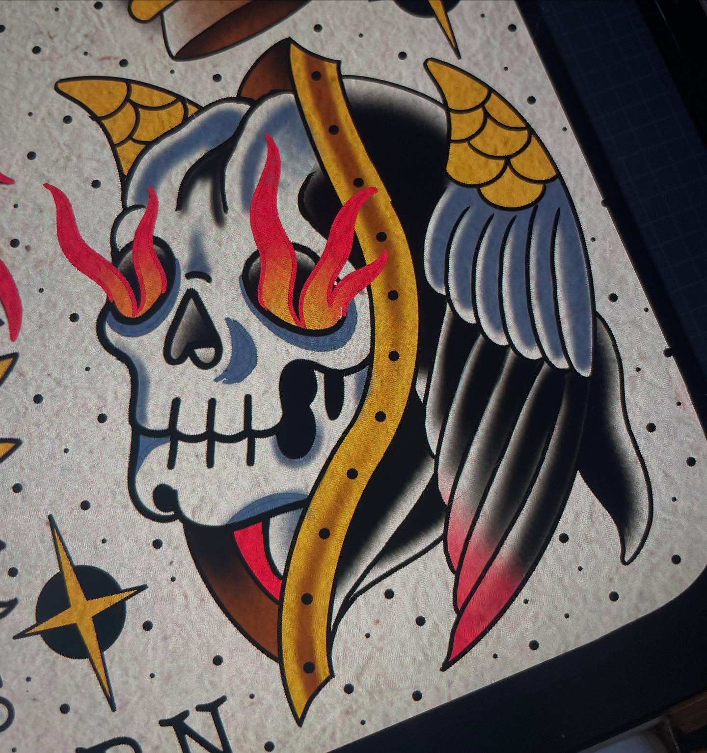 Skull with flames American traditional tattoo by Josh Johns