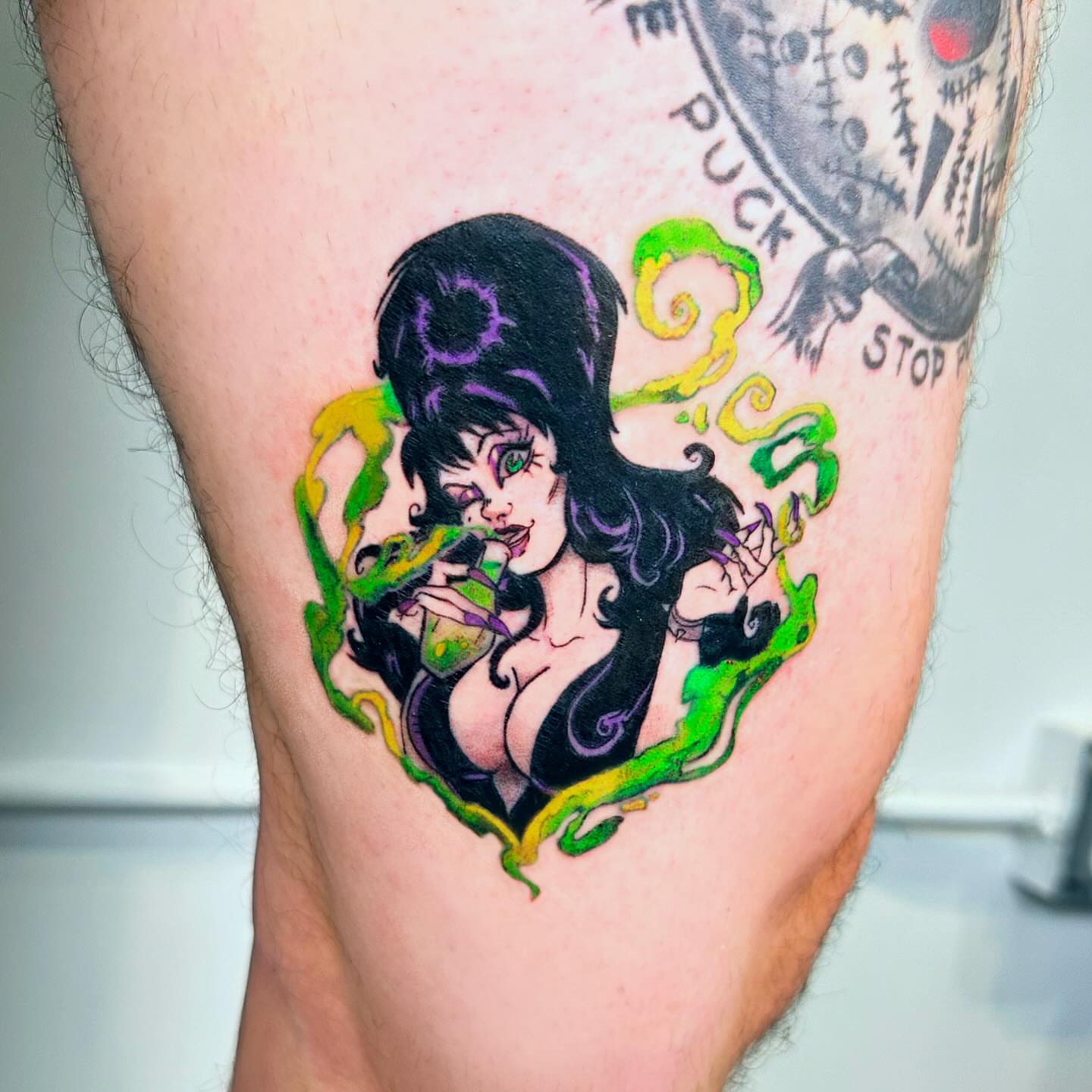 Vampire woman illustrative tattoo on the thigh by Lex
