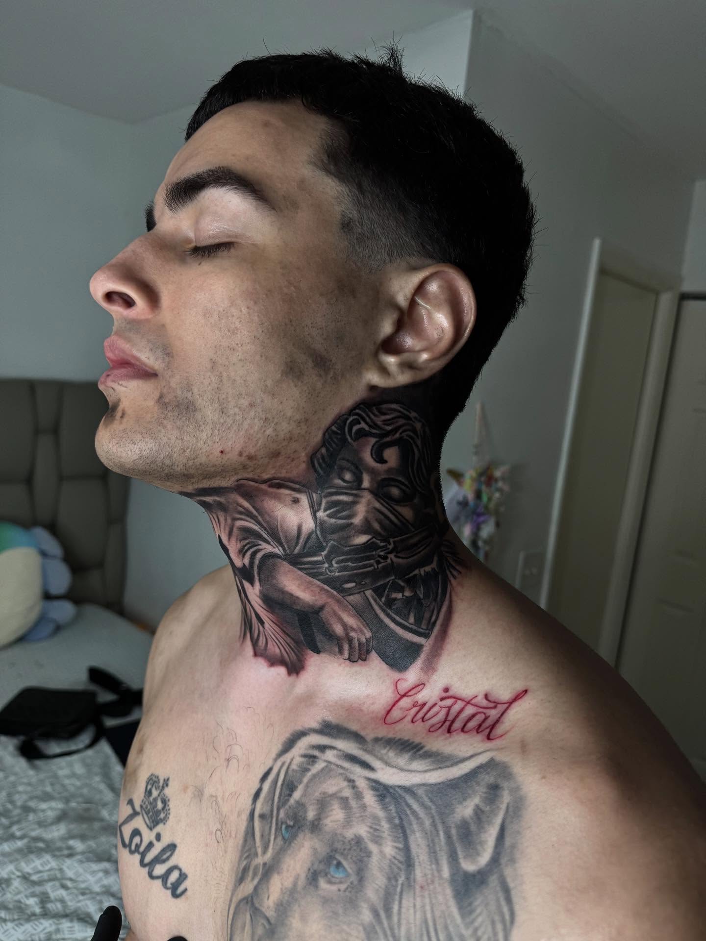 Dog realism tattoo on the chest by Tattoos in Fort Myers, Fl
