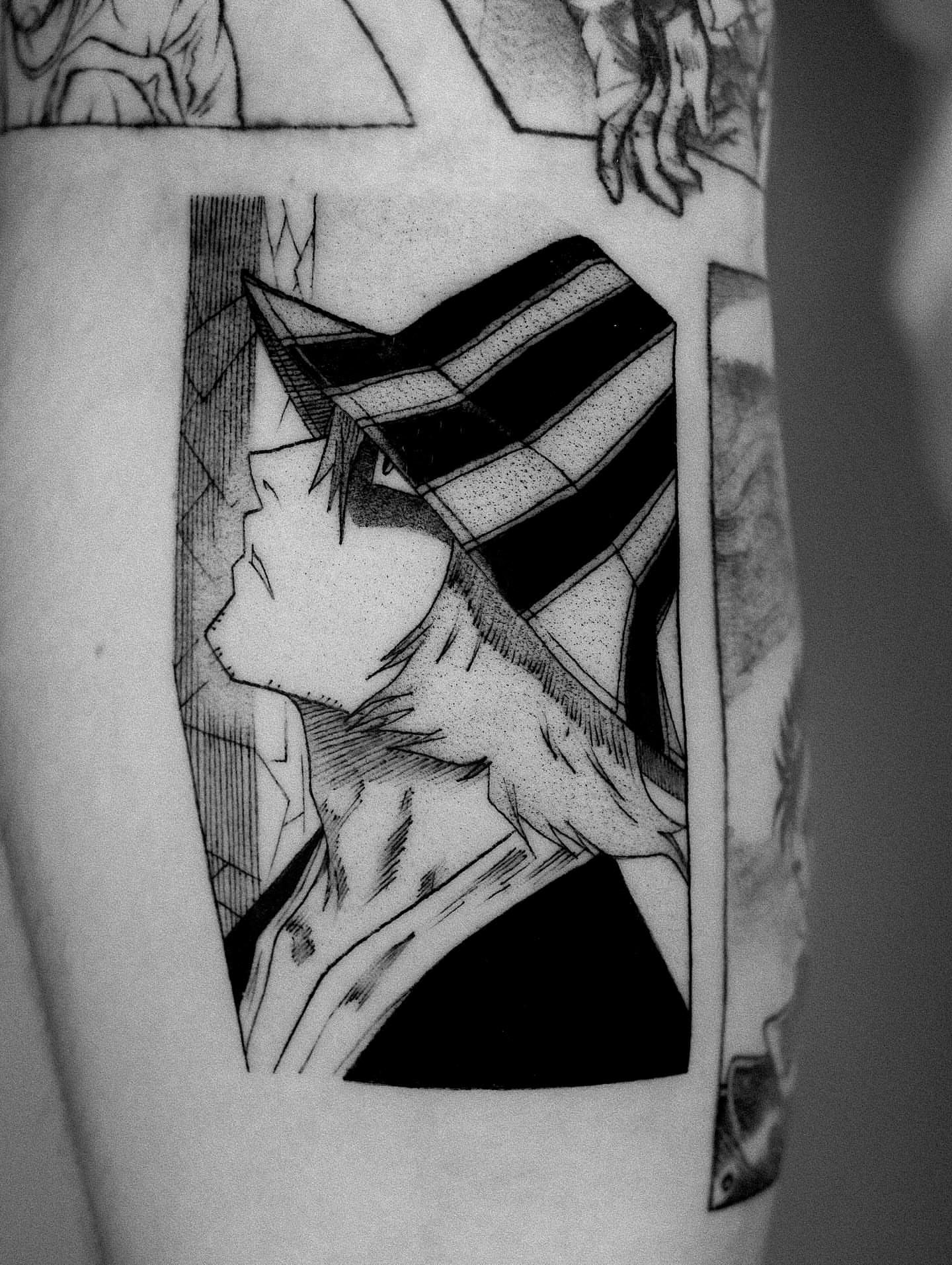 Man wearing hat black and grey tattoo on the forearm by Anime, Amsterdam, Noord-Holland