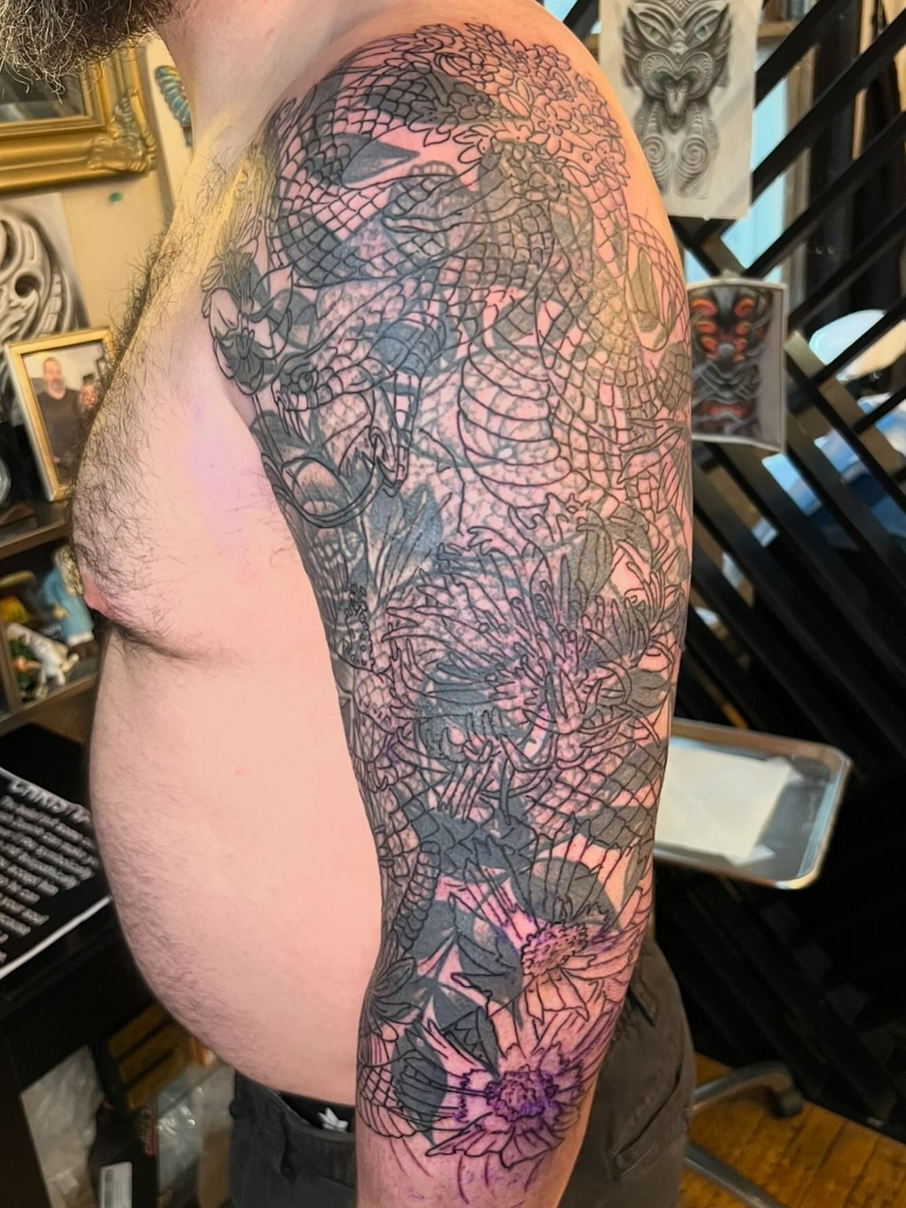 Dragon and chrysanthemum japanese irezumi tattoo on the forearm by Patrick Cornolo