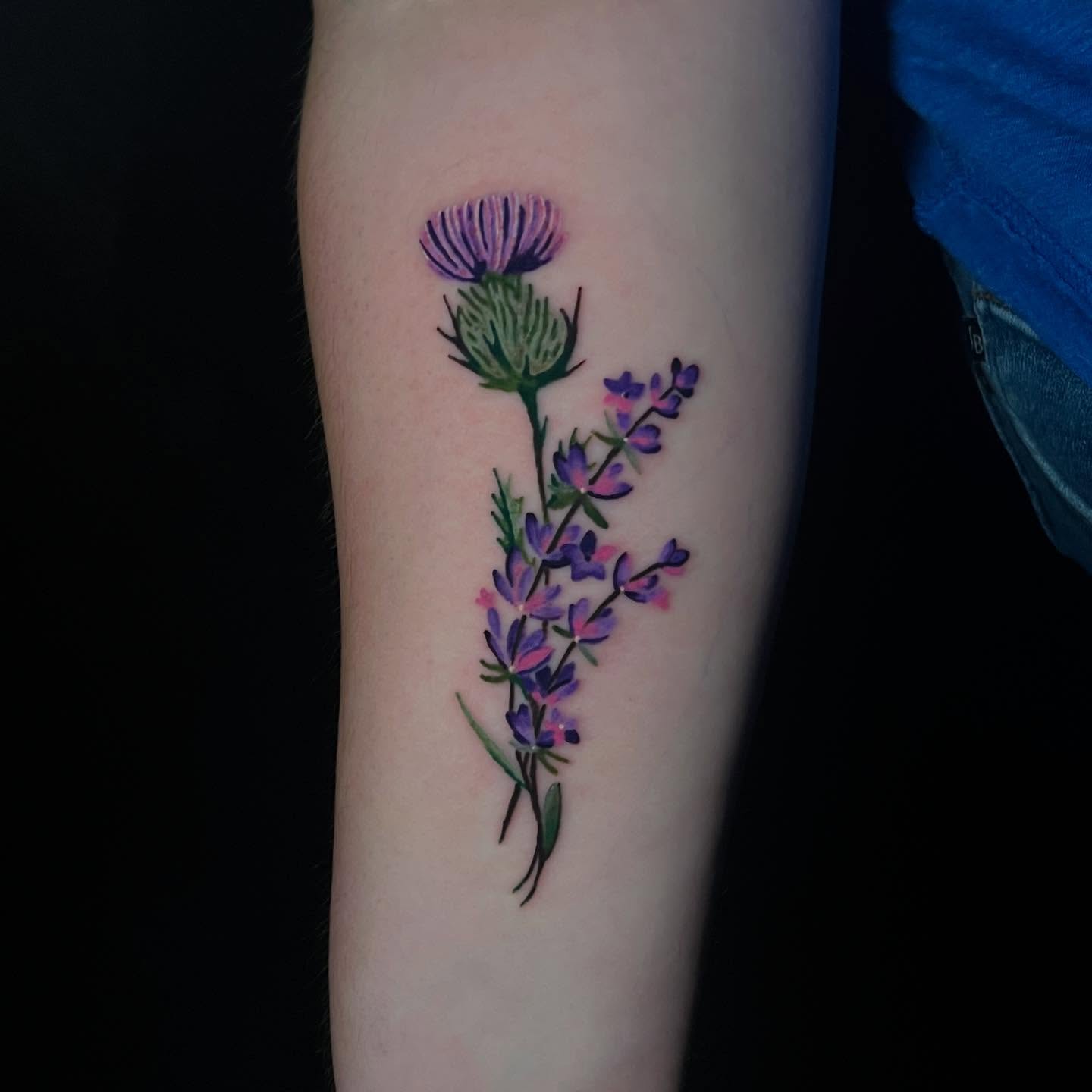 Thistle and lavender watercolor tattoo on the forearm by Brooke, Kansas City, Missouri