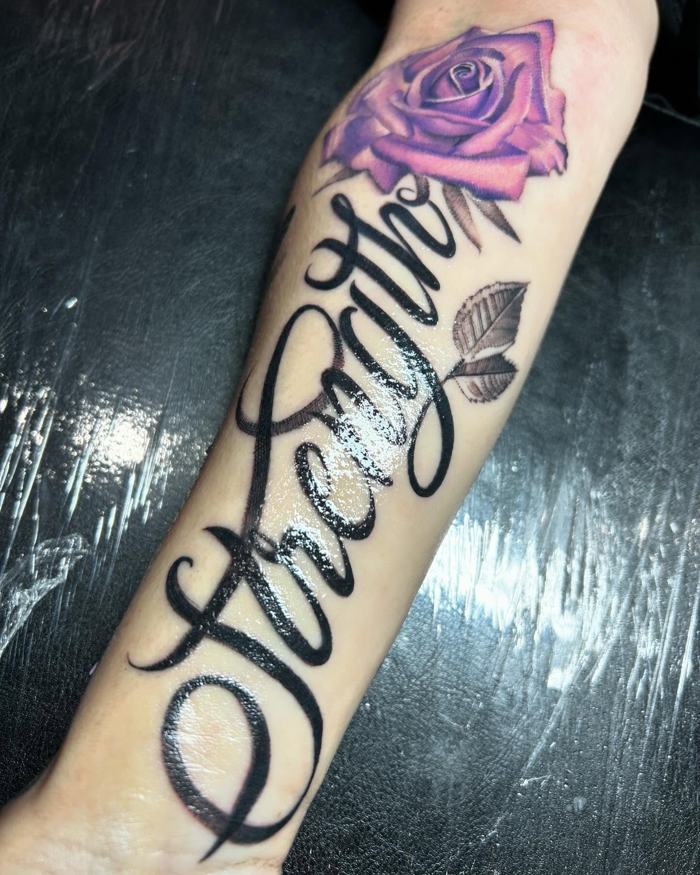 Strength lettering script tattoo on the forearm by Demonic Love Child Tattoos
