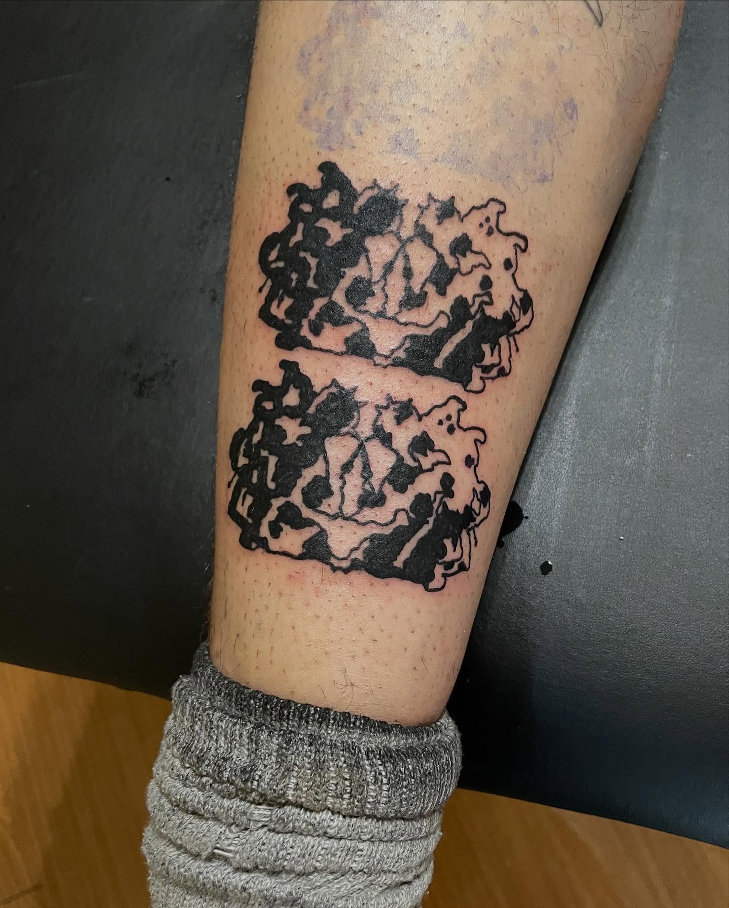 Abstract pattern black and grey tattoo on the forearm by @emotionalthugtattoo