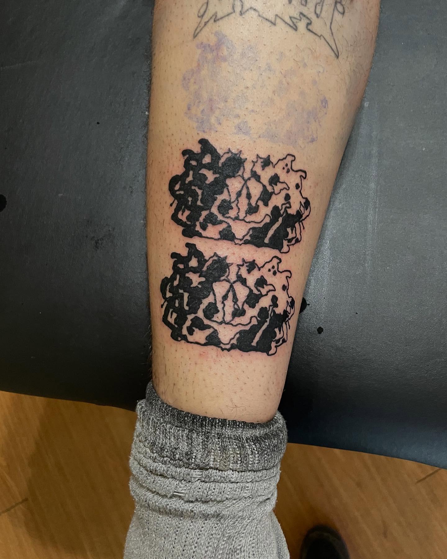 Abstract pattern black and grey tattoo on the forearm by @emotionalthugtattoo