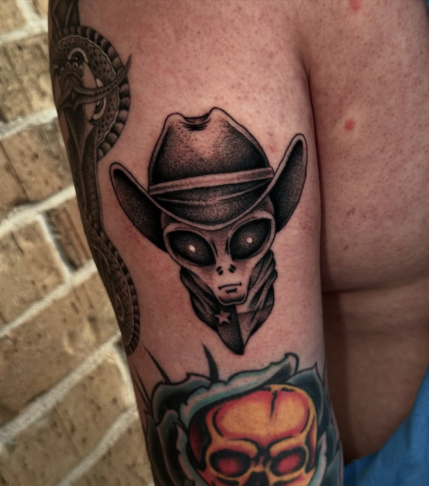 Alien wearing cowboy hat realism tattoo on the forearm by Matthew, Georgetown, Texas