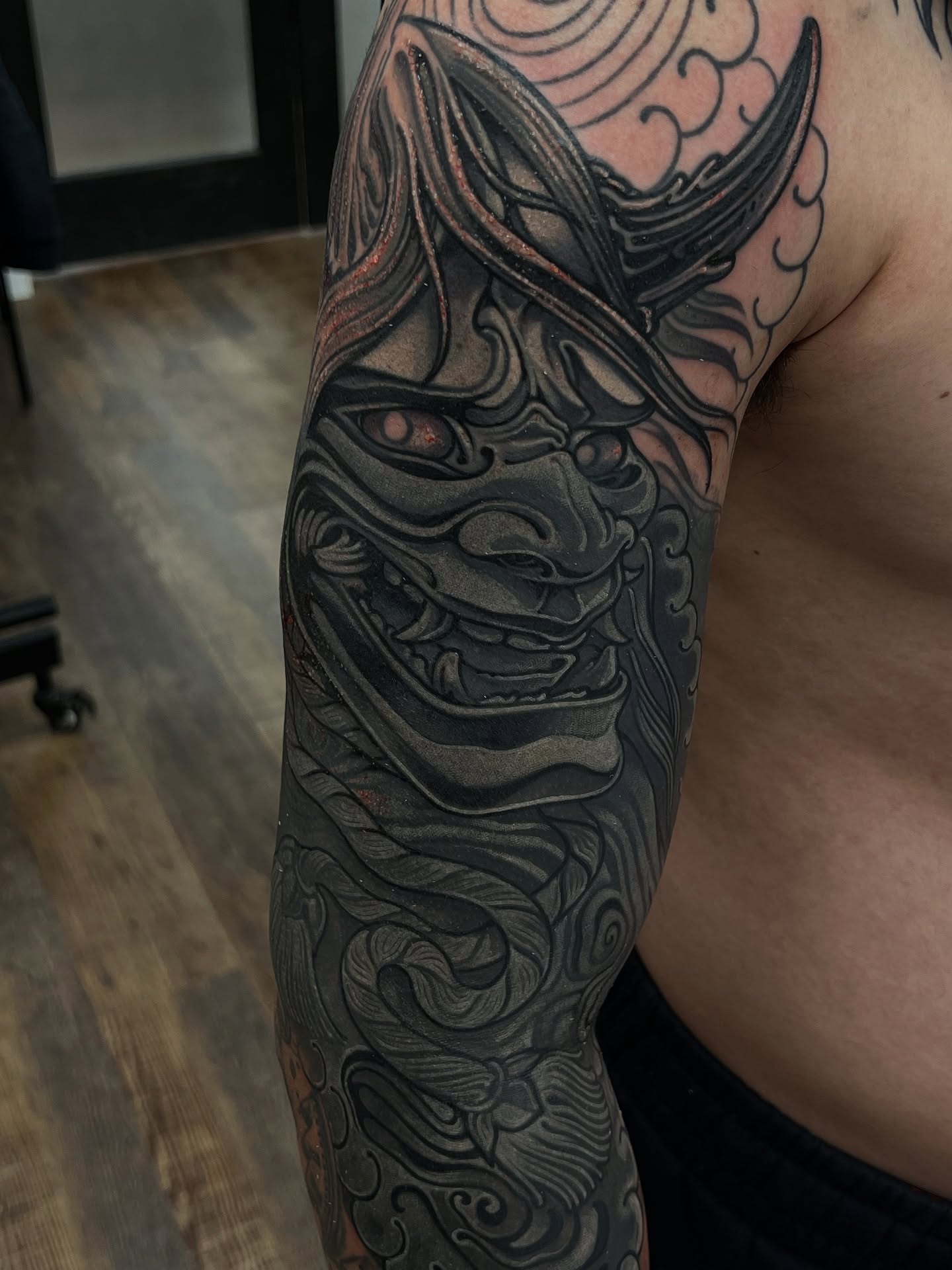 Demon mask japanese irezumi tattoo on the forearm by Fredd Chino