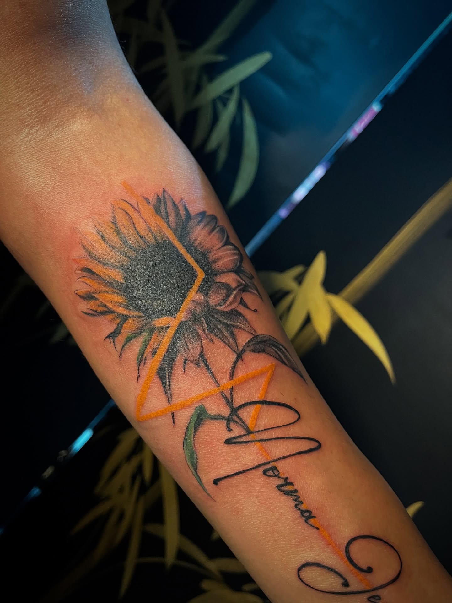 Sunflower realism tattoo on the forearm by Christa Martinez