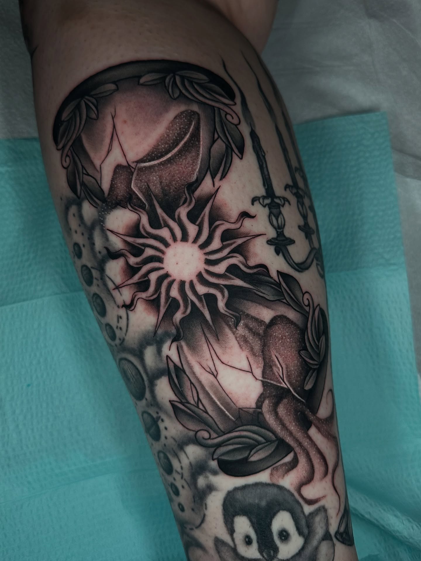 Astronomy-themed tattoo realism tattoo on the forearm by Sam Minneci