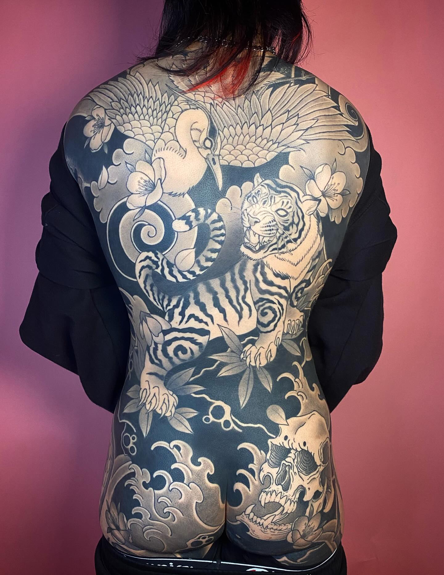 Tiger and dragon japanese irezumi tattoo on the back by Barbara Niblo