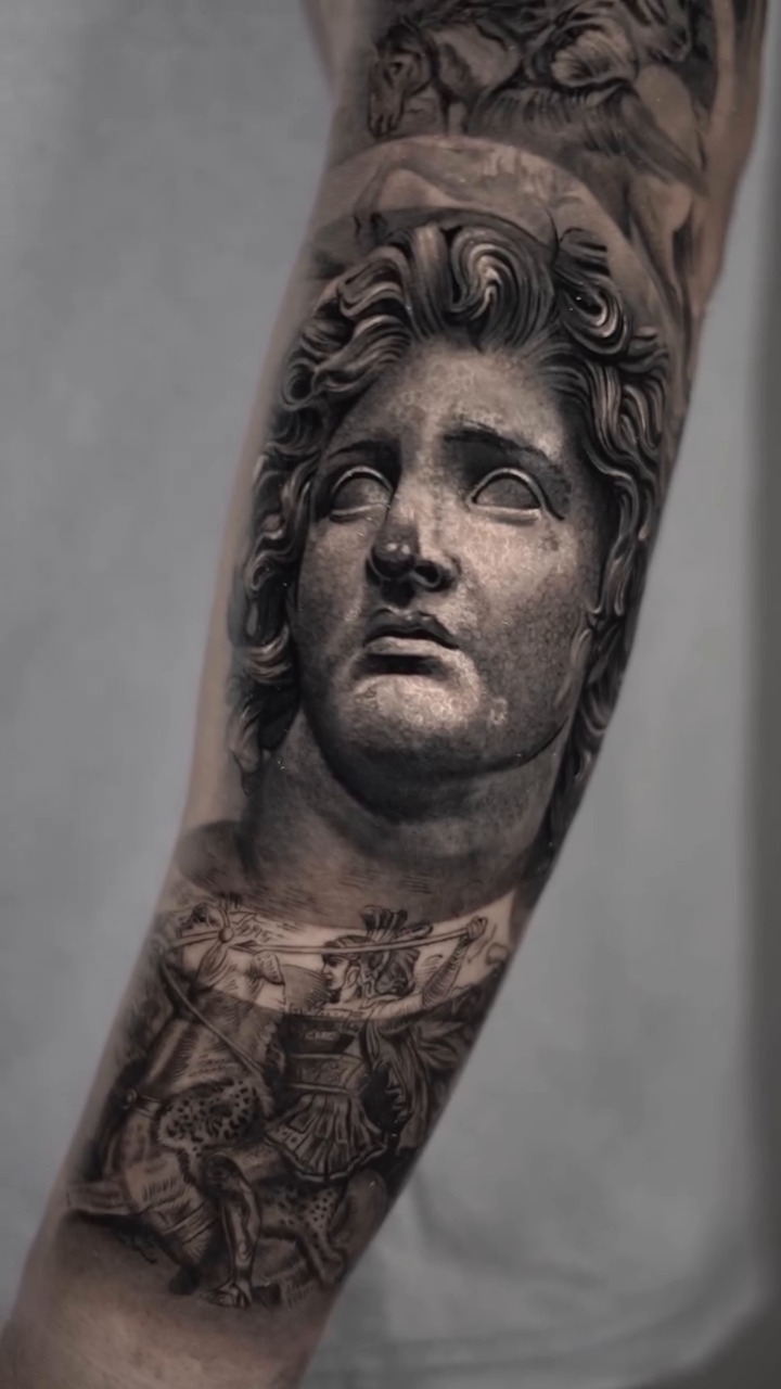 Bust of a classical figure realism tattoo by Sara Nieto.