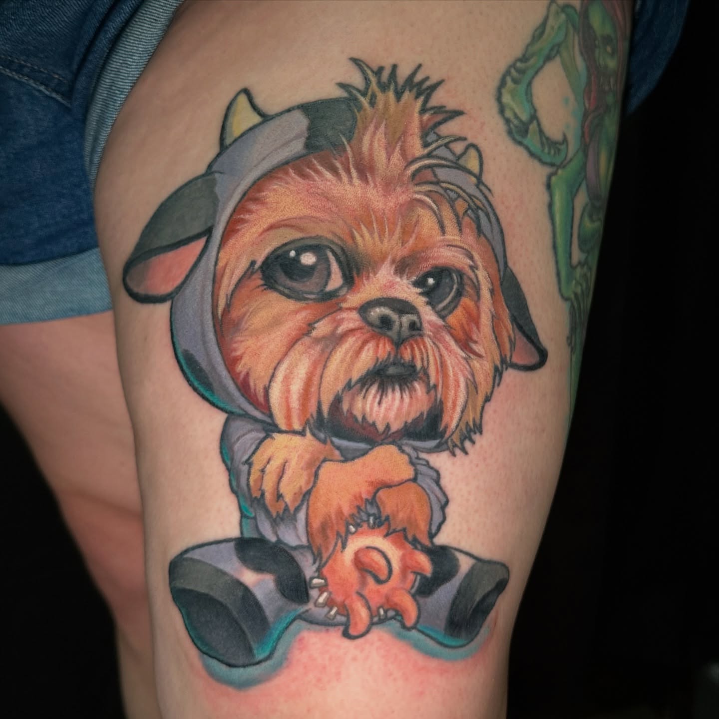 Ewok dog realism tattoo on the thigh by shane baker