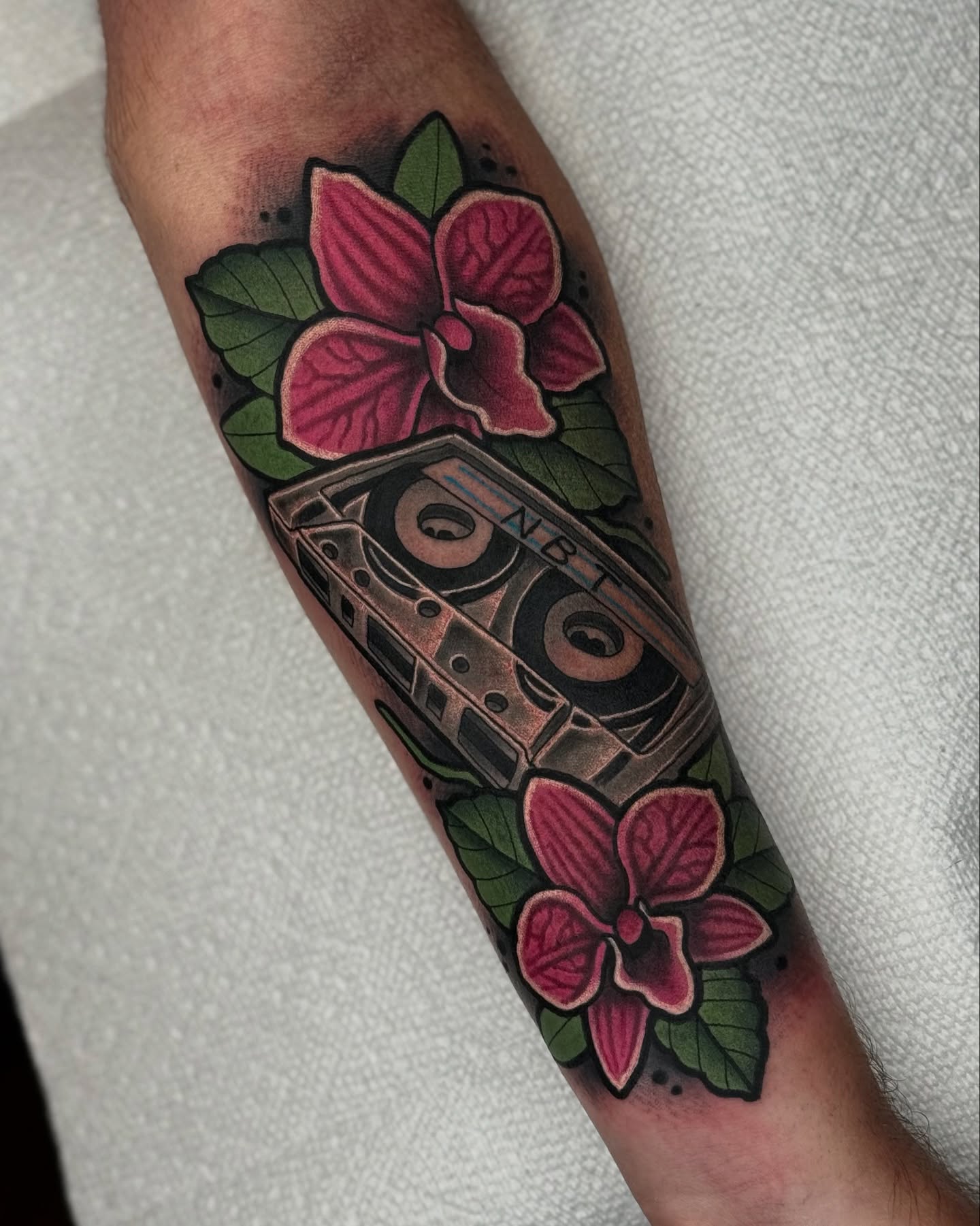 Boombox and flowers American traditional tattoo on the forearm by T Dubs ✏️