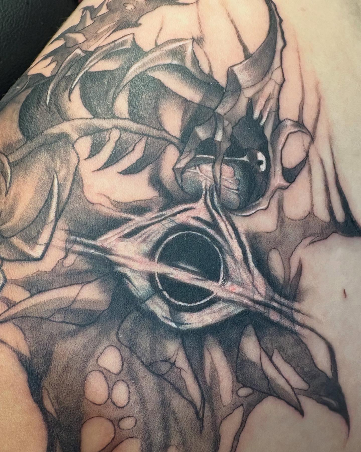 Eye dark realism tattoo on the shoulder by Slade Nowicki