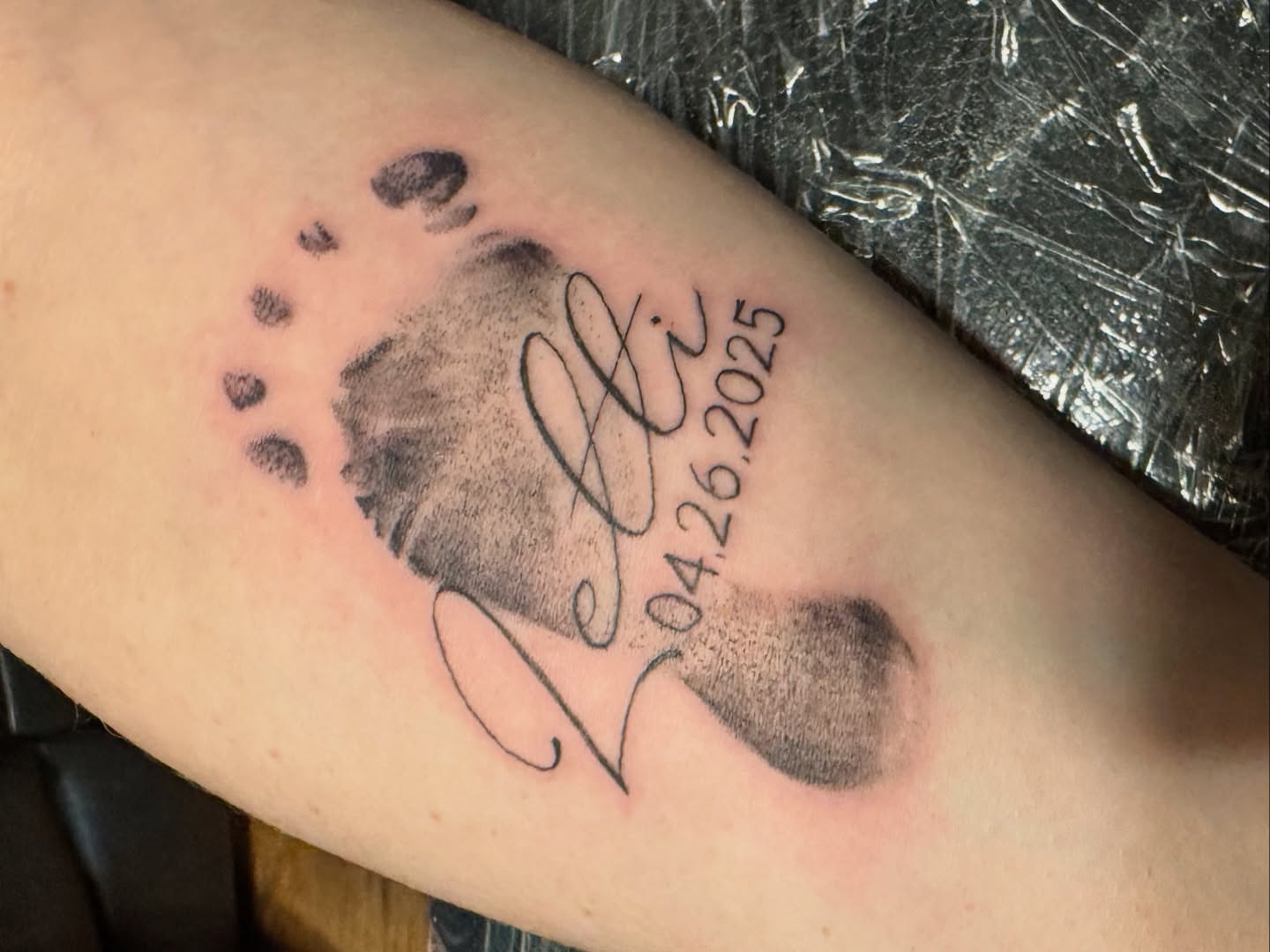 Fingerprint and signature dotwork tattoo on the forearm by Matthew Clanin