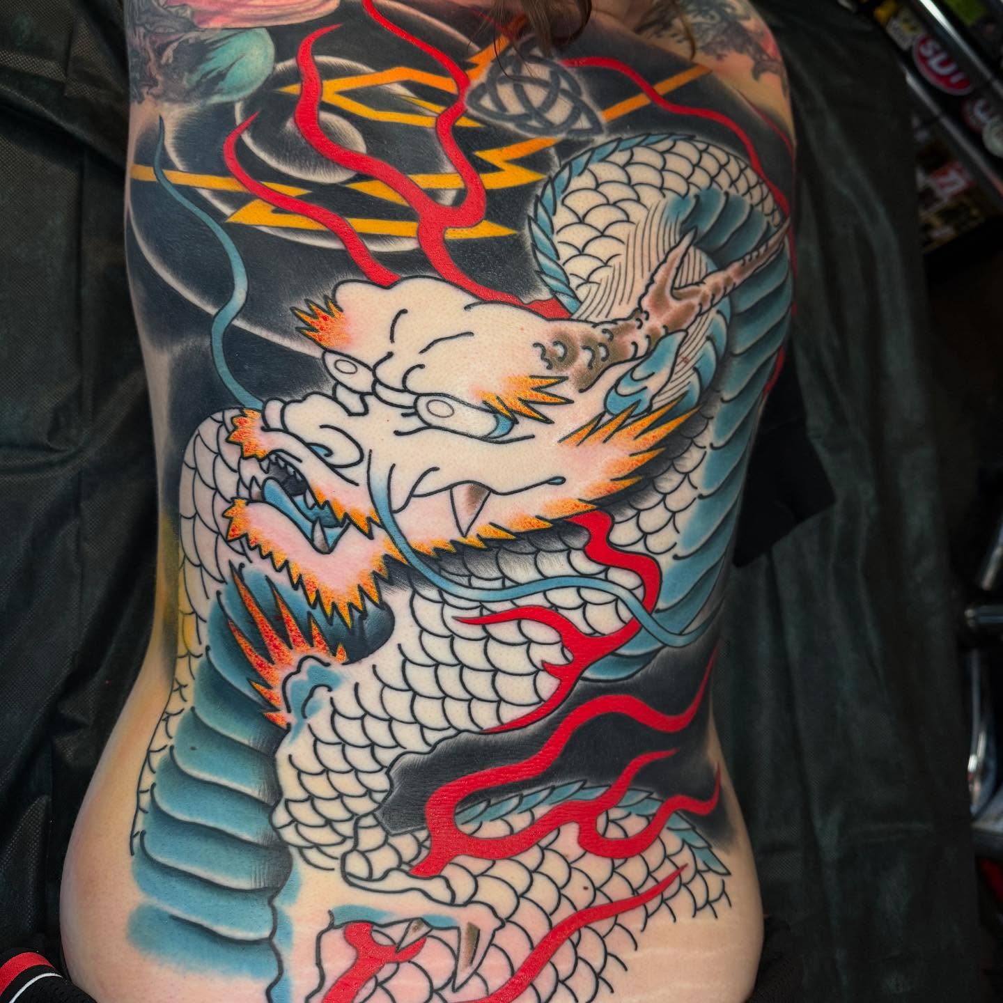 Dragon japanese irezumi tattoo on the torso by Mike Diamond