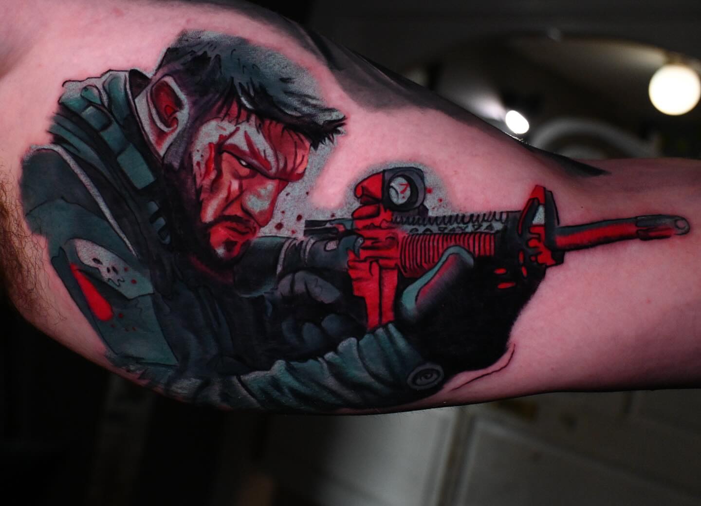 Soldier aiming gun realism tattoo on the forearm by William Pollock