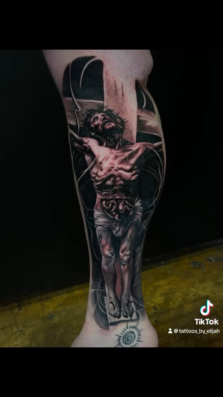 Jesus Christ on the cross realism tattoo by @tattoos_by_elijah
