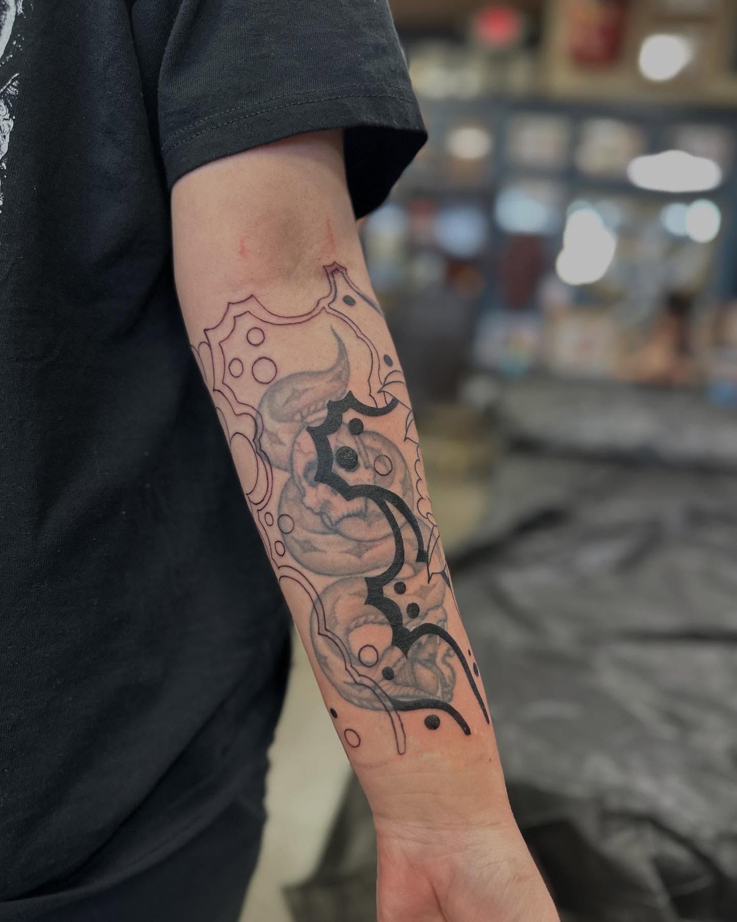 Abstract design dotwork tattoo on the forearm by Shawn Feng