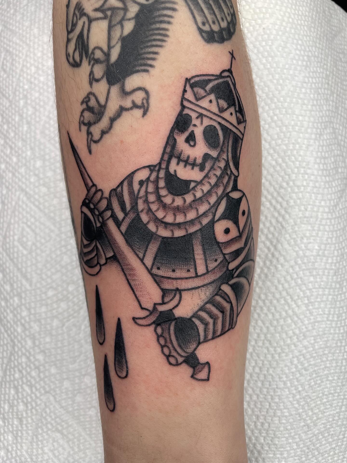 Skeleton knight black and grey tattoo on the forearm by Josh Johns