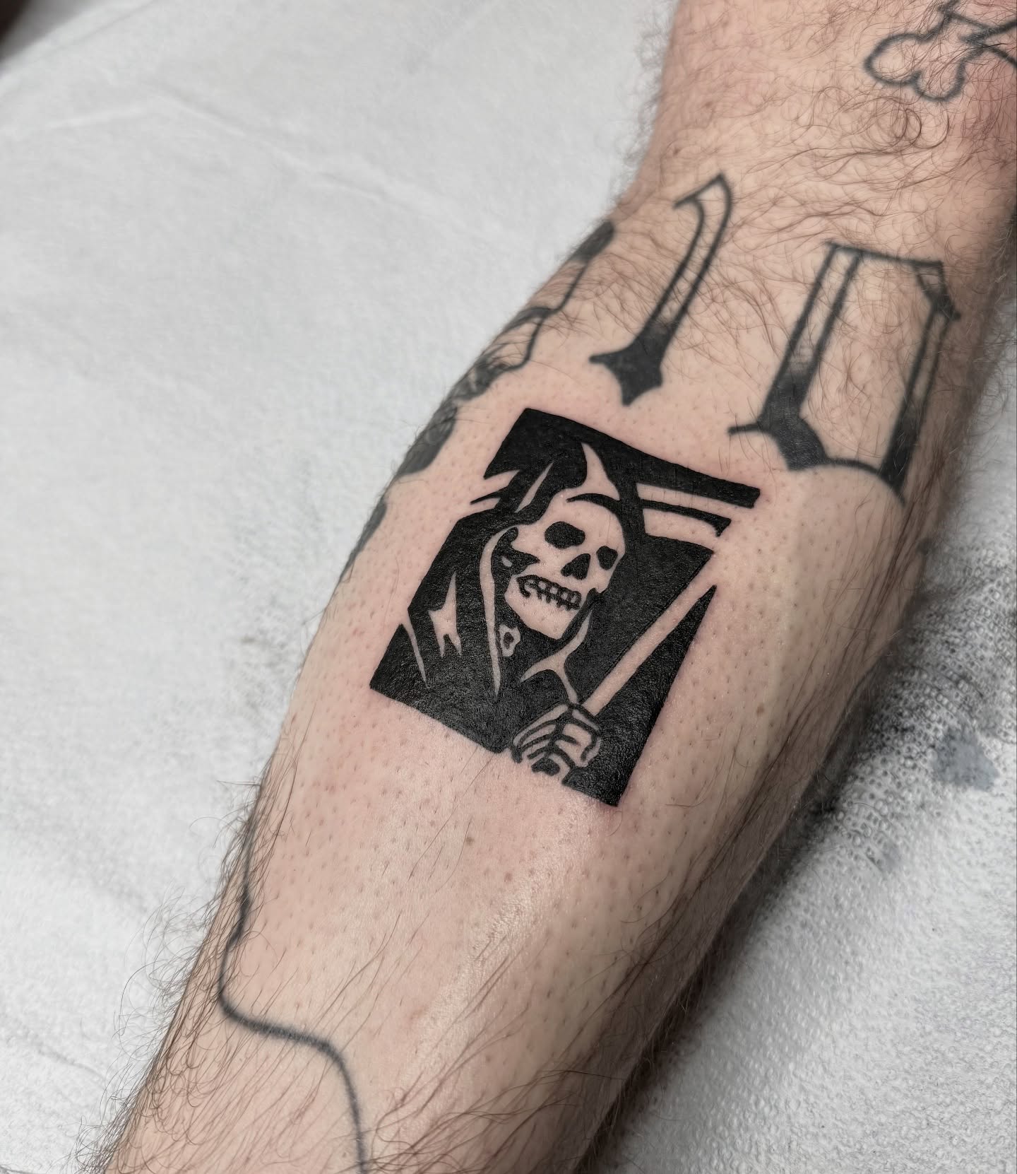 Reaper black and grey tattoo on the forearm by Han shinko, Portland, Oregon