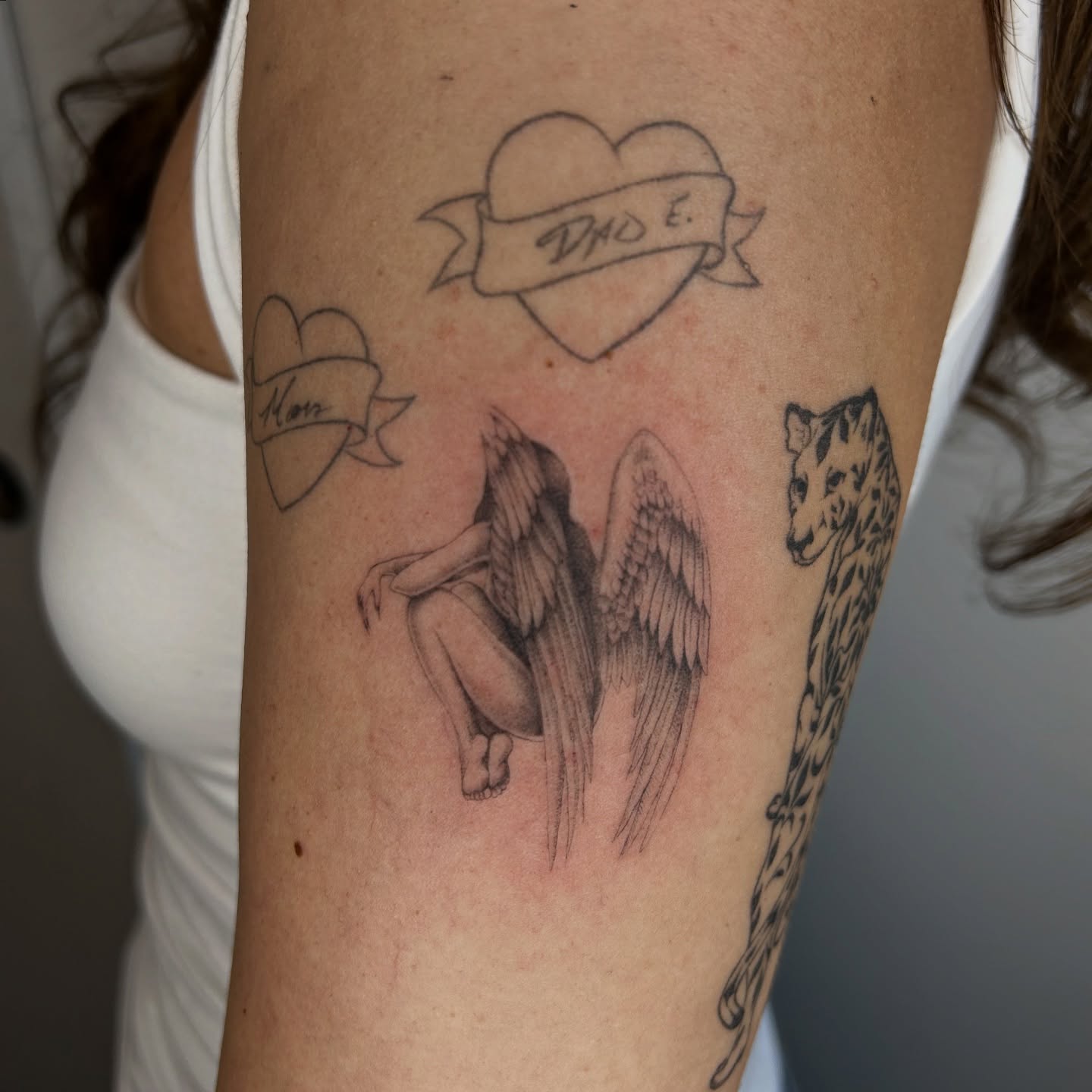 Angel and leopard black and grey tattoo on the forearm by ✭ Elisa ✭