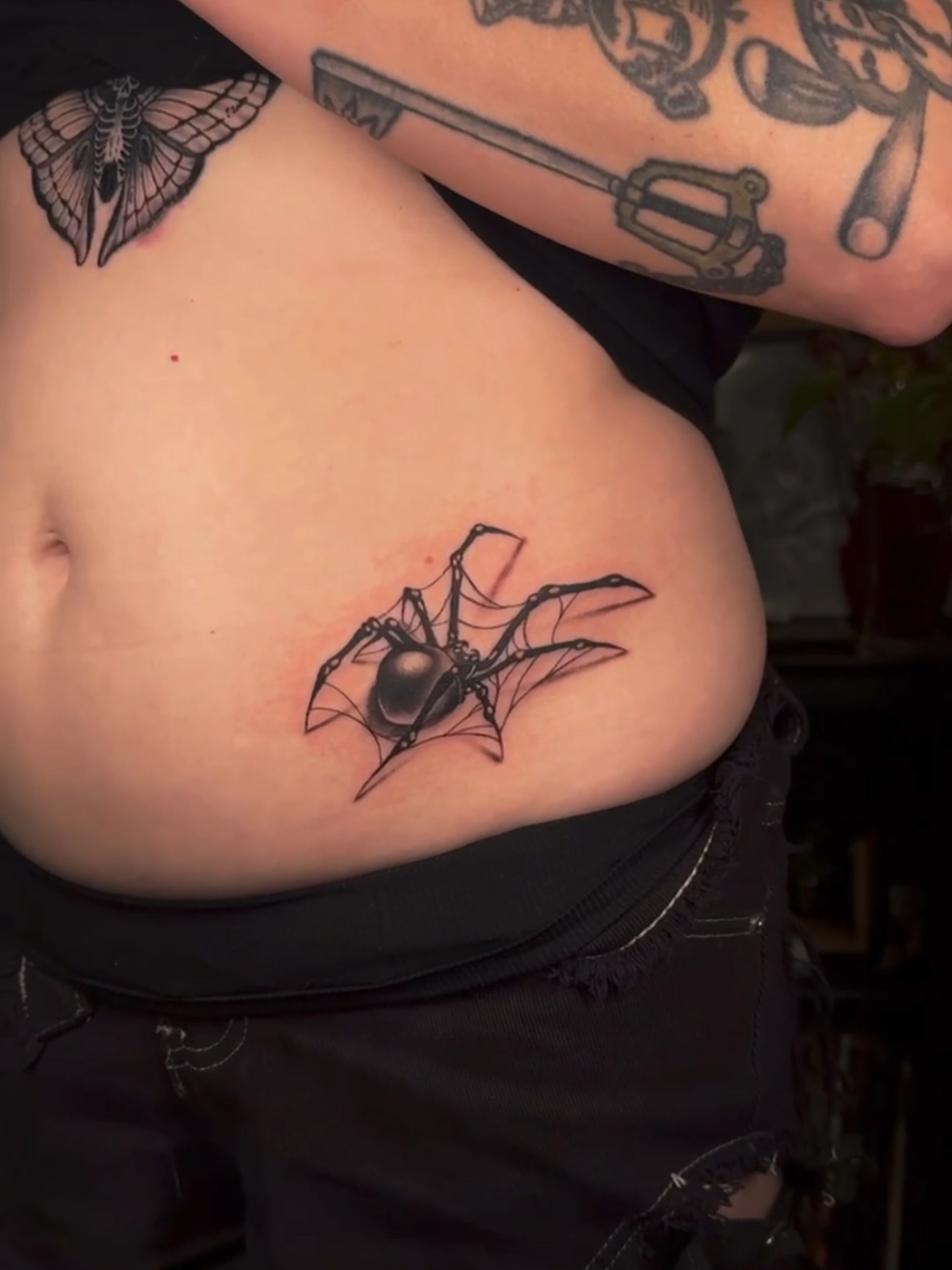 Spider black and grey tattoo on the ribs by πππͺ‘