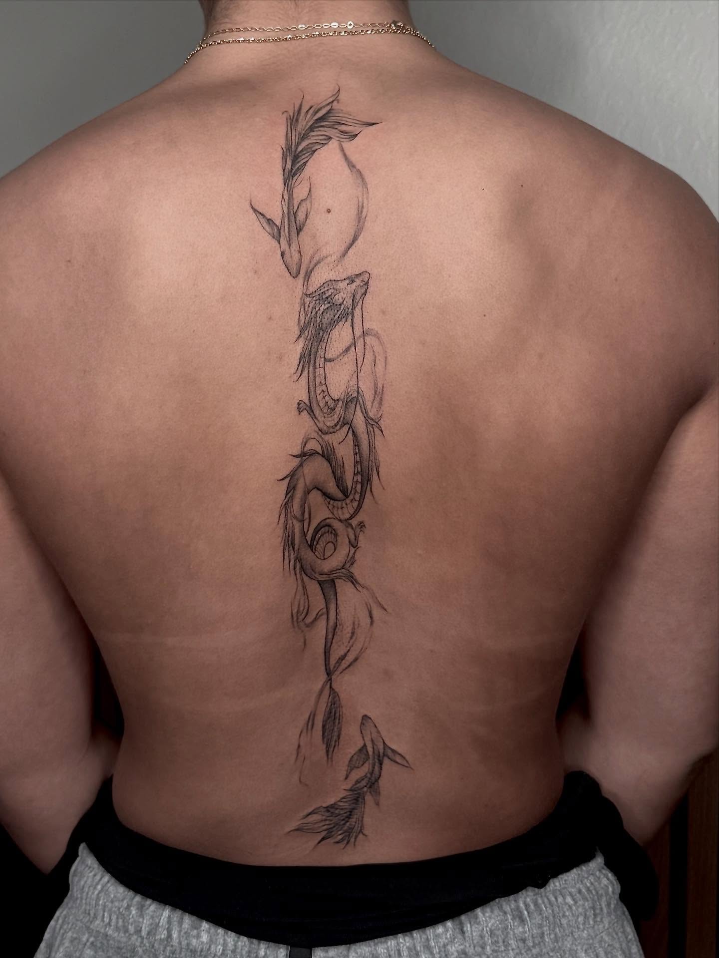 Serpent black and grey tattoo on the back by Jocelyn