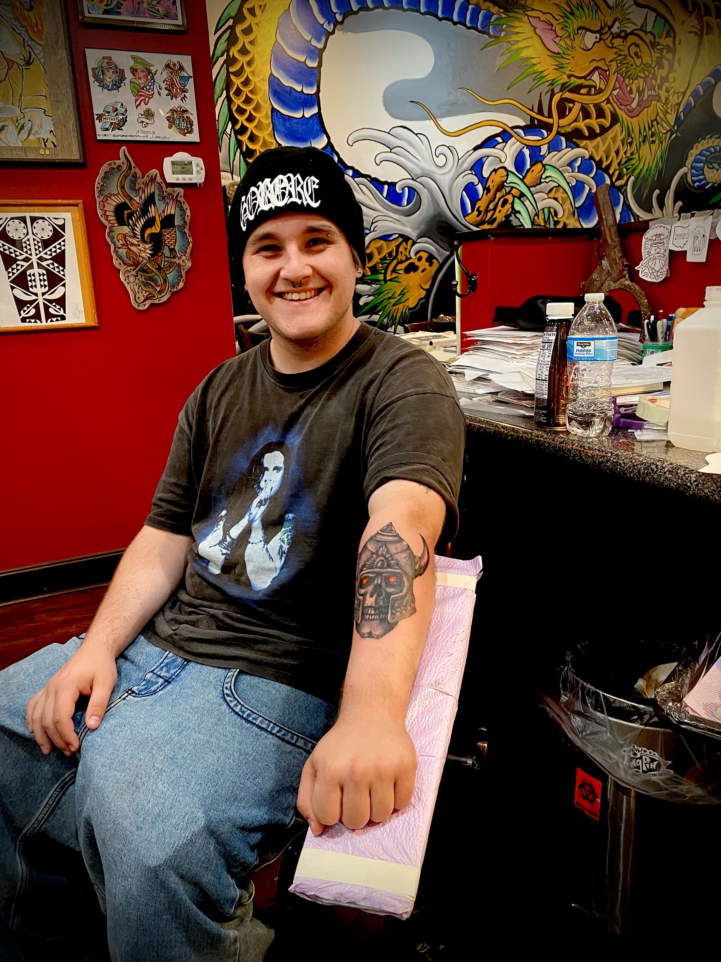 Skull American traditional tattoo on the forearm by Christopher Sanders