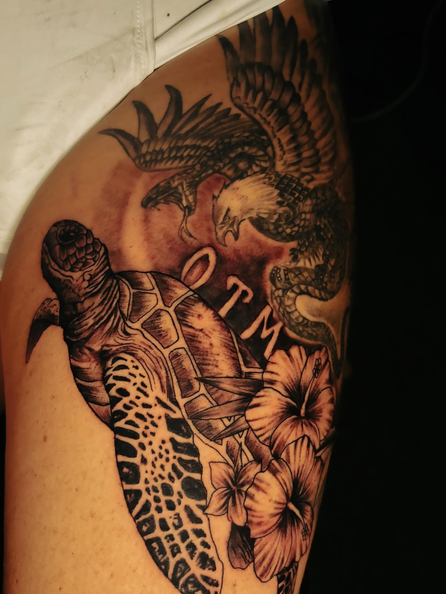 Turtle and eagle American traditional tattoo on the shoulder by Shane Boss, Toronto, Ontario