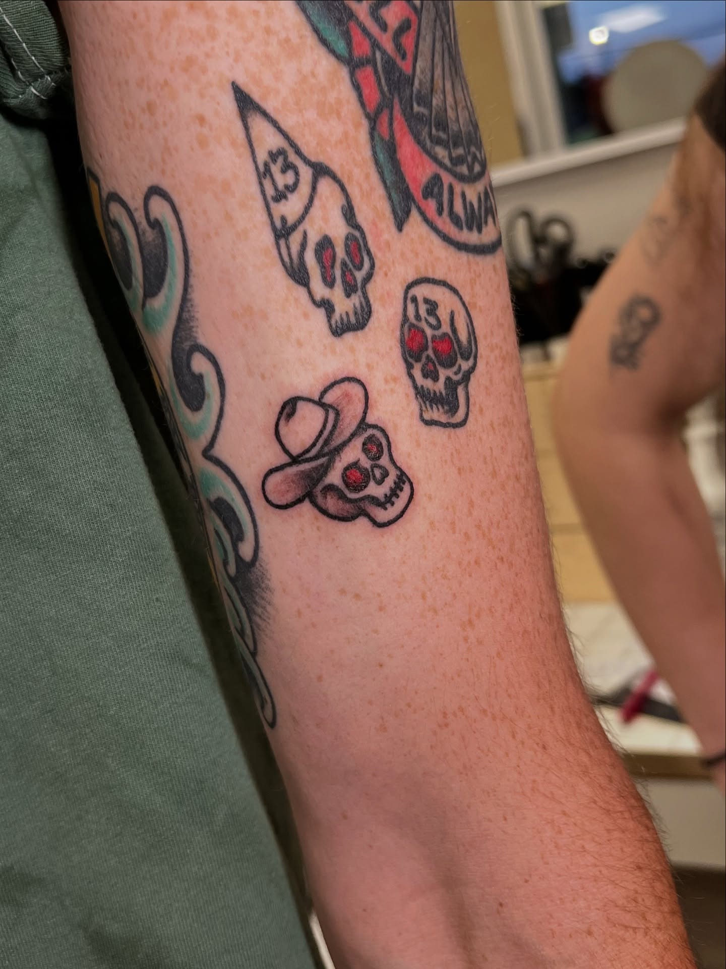 Skulls American traditional tattoo on the forearm by tatman cris 🥀 dfw tattoo artist
