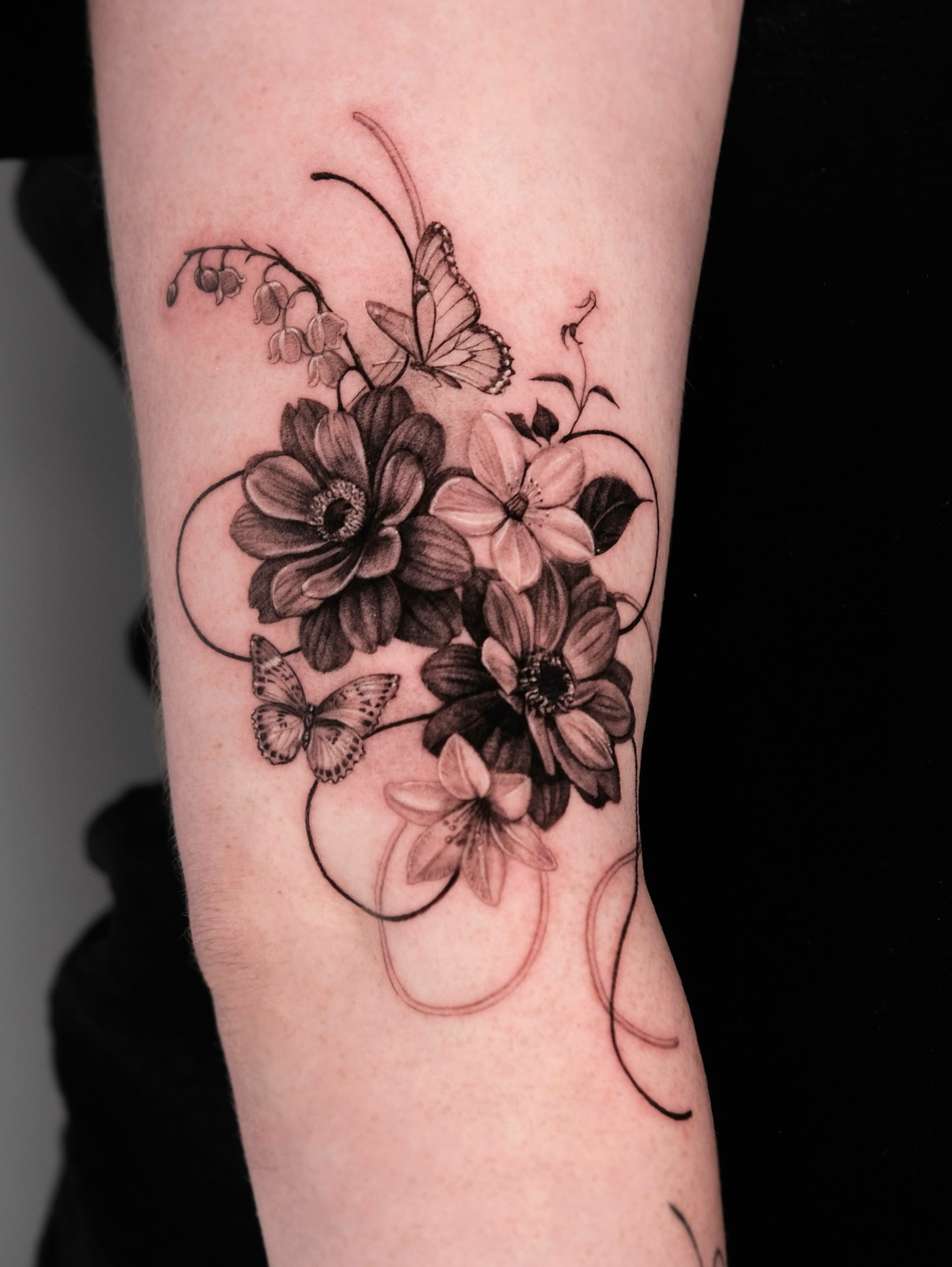 Flowers and butterflies realism tattoo on the forearm by Da-An ･ﾟ✧ 다 안 𓇬˖