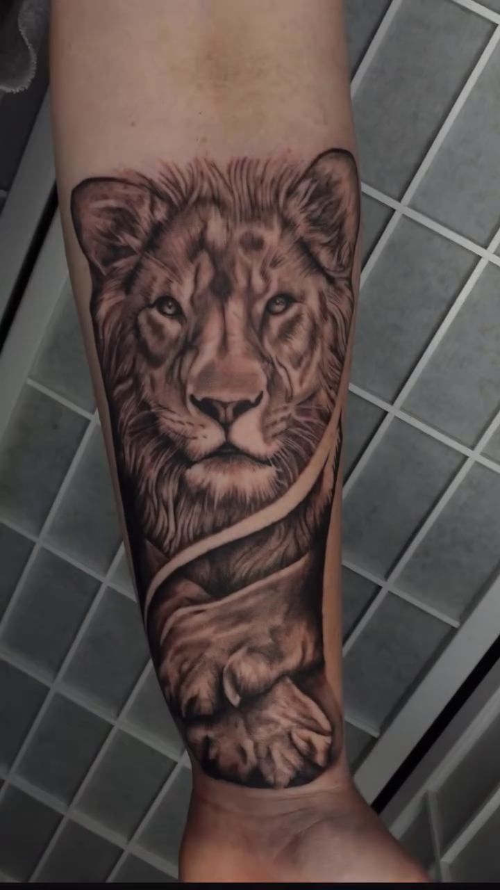 Lion's head realism tattoo by Tat by Brendan