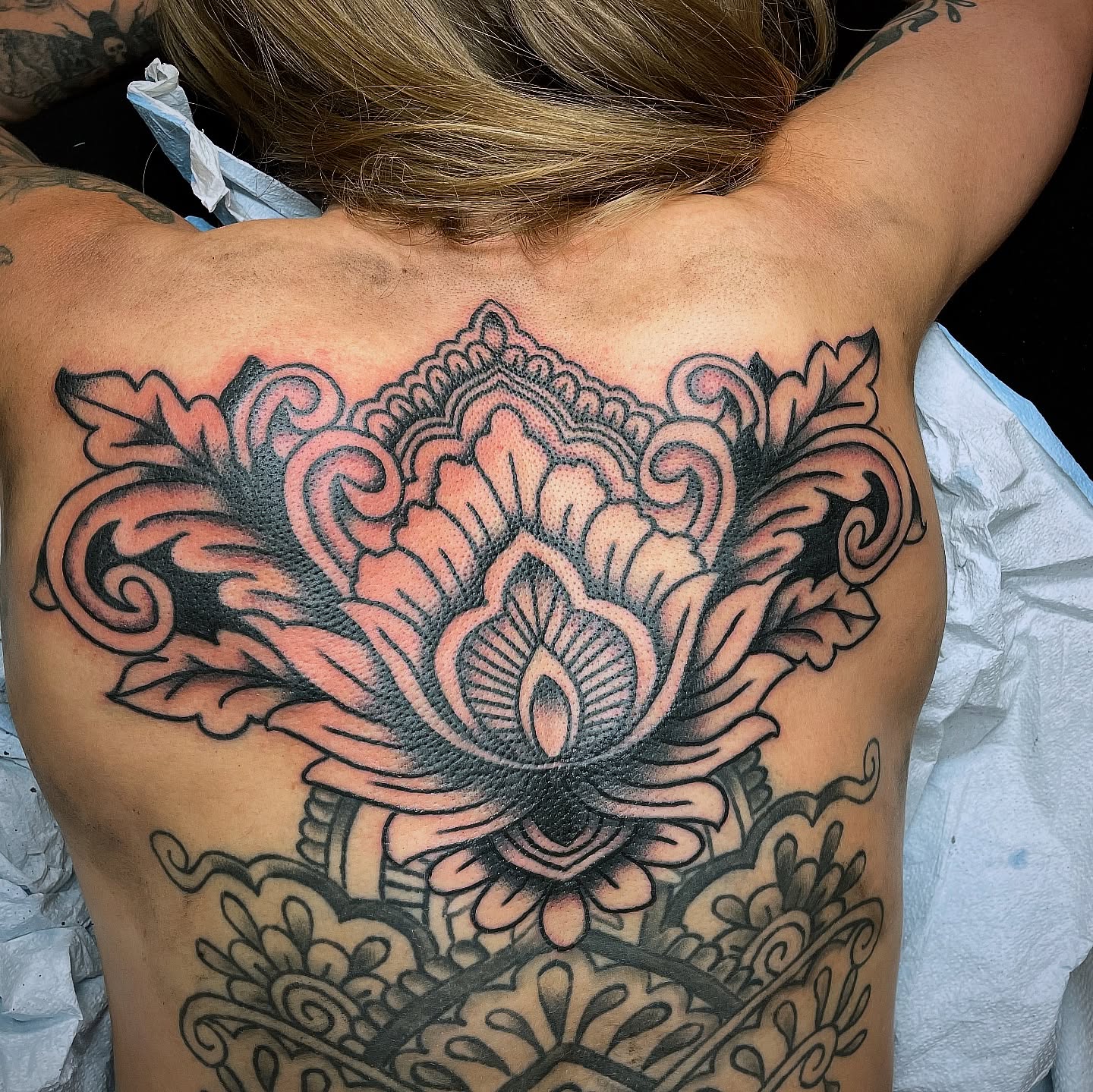 Lotus flower American traditional tattoo on the back by Cam TallBoy SLC Tattoo Artist, Salt Lake City, Utah
