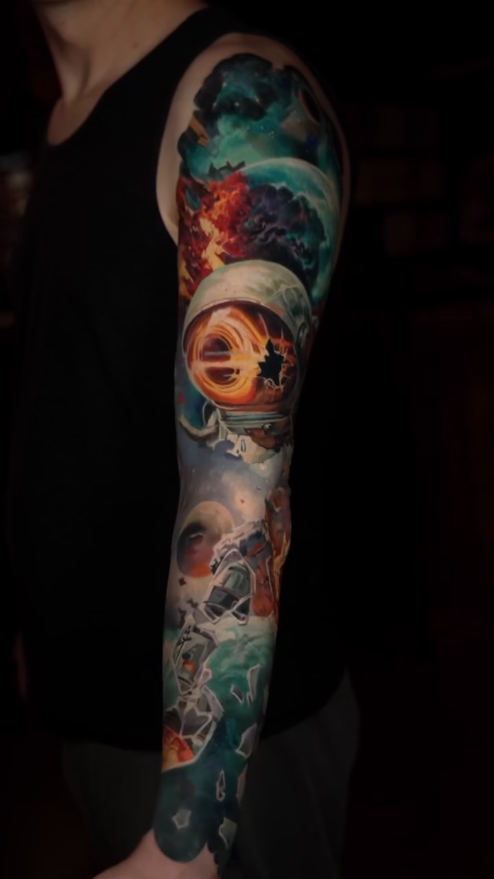 Eye and galaxy realism tattoo by Slava Bodrov