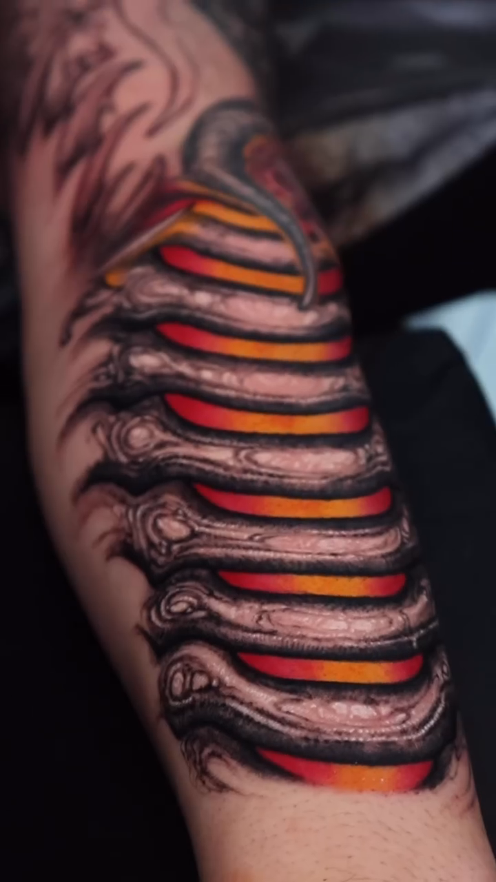 Ribcage realism tattoo by Dark tattoo