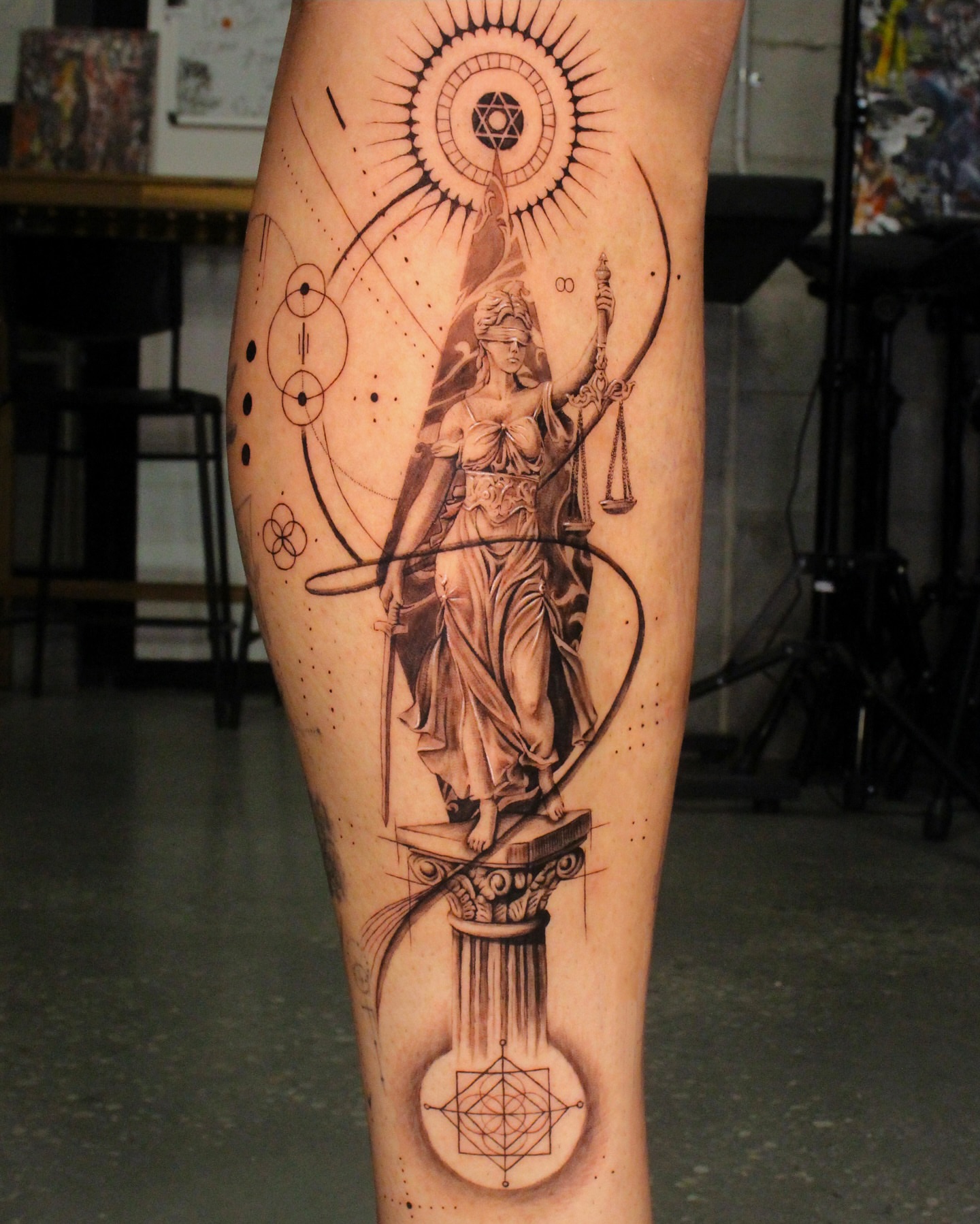 Statue of justice realism tattoo on the calf by Tattoo artist EJ (Mireu)
