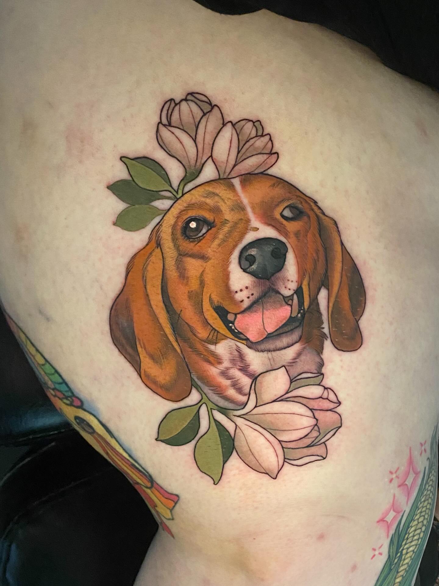 Beagle with flowers realism tattoo on the thigh by Connie Fiorino - Tattoo Artist