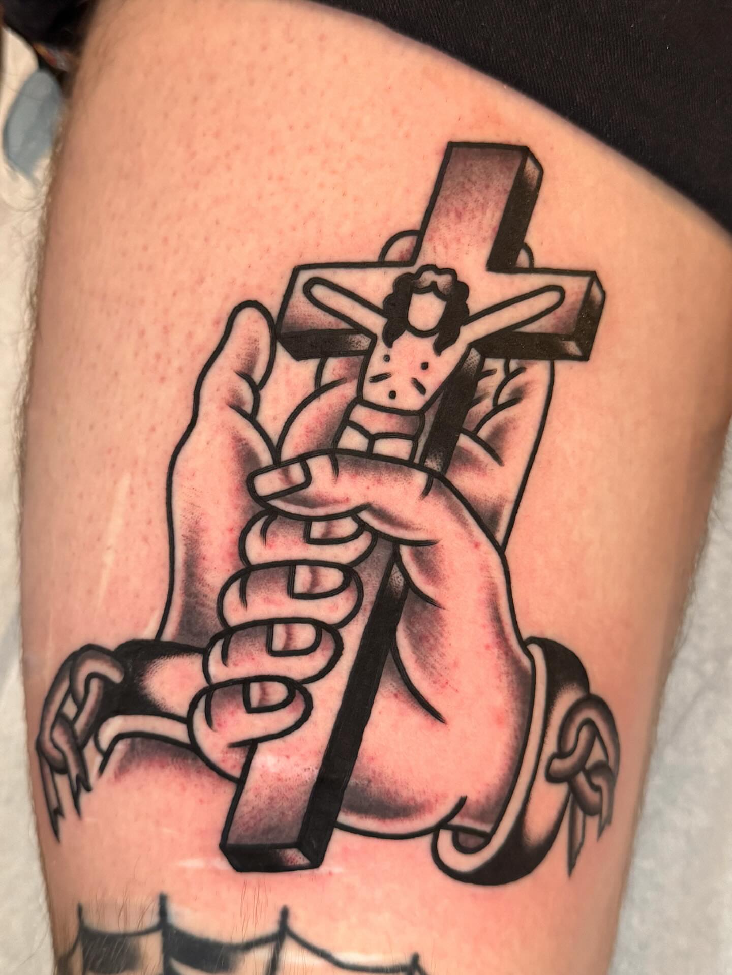 Crucifixion scene American traditional tattoo on the thigh by James Shepherd, Austin, Texas