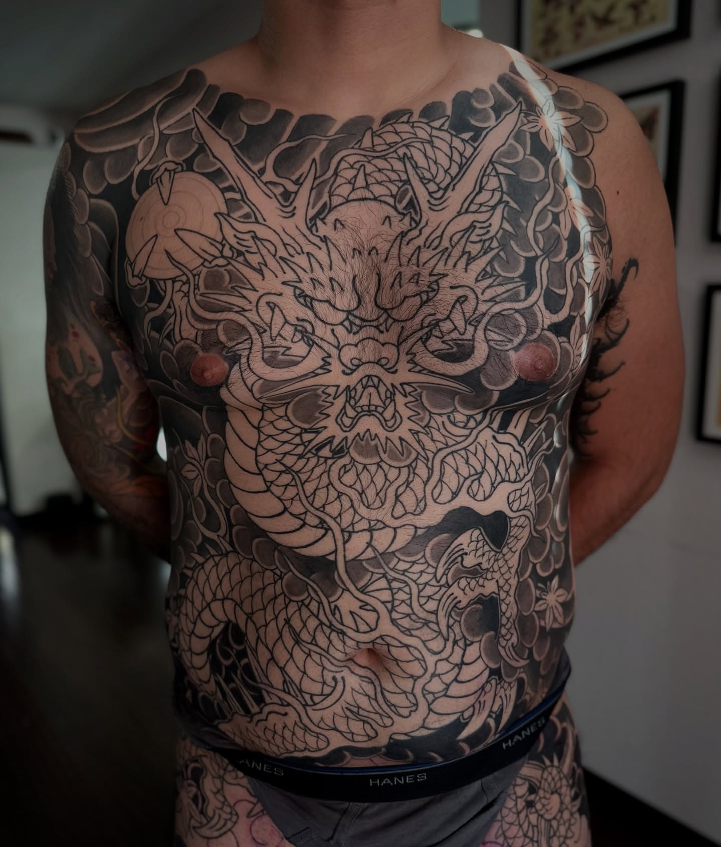Dragon japanese irezumi tattoo on the chest by Kenny Waizumi ๐