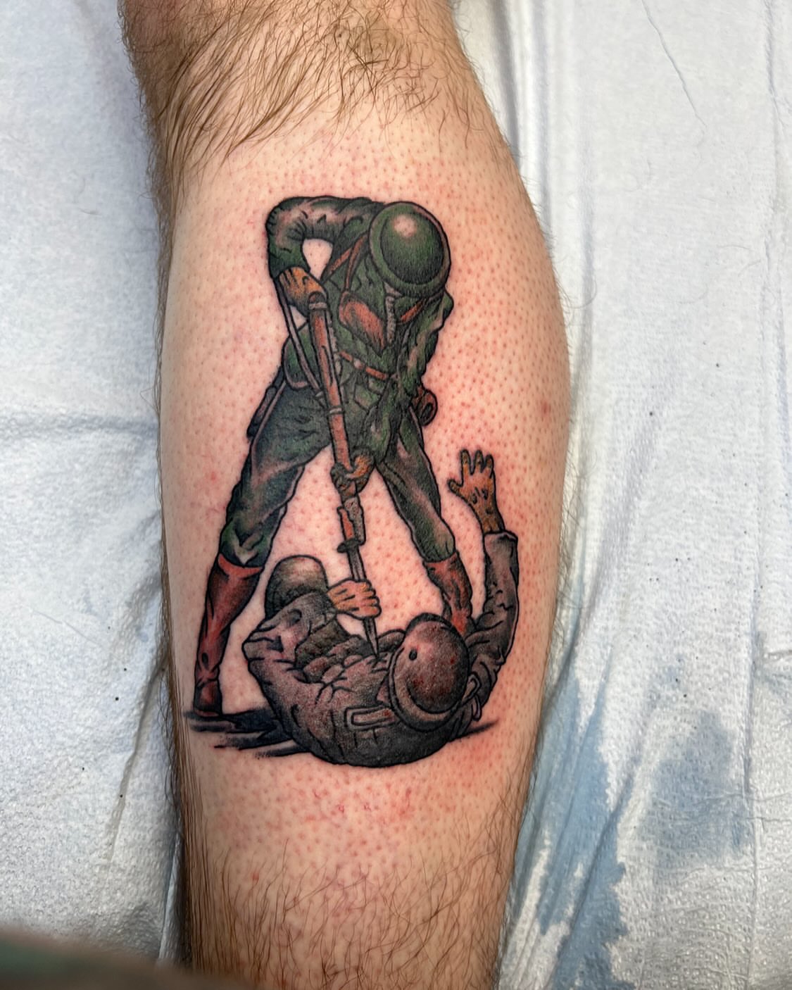 Soldiers realism tattoo on the forearm by Cody Marl