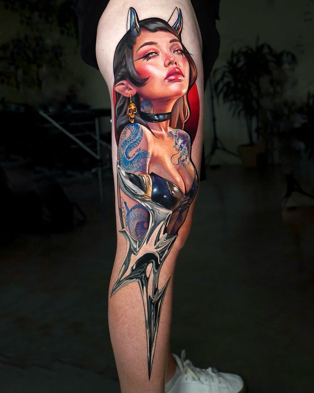Demon girl with dragons and sword neo-traditional tattoo on the forearm by Daria Pirojenko