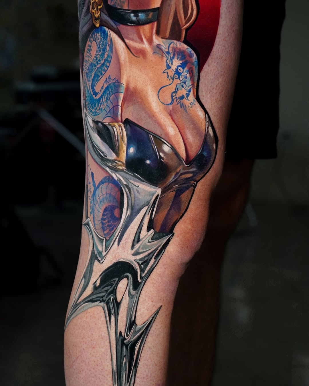 Woman with dragons and mechanical elements surrealism tattoo on the thigh by Daria Pirojenko
