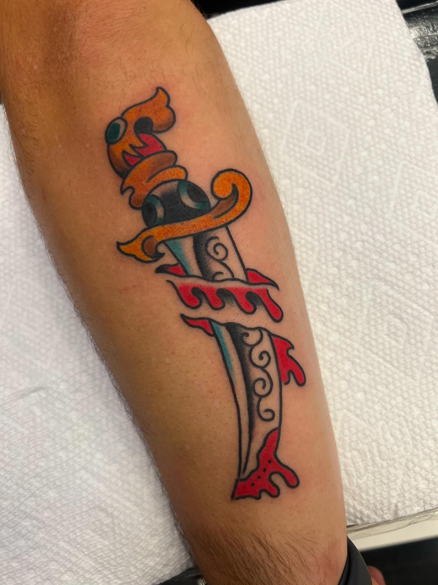 Sword American traditional tattoo on the forearm by Alva - DFW Tattoo Artist
