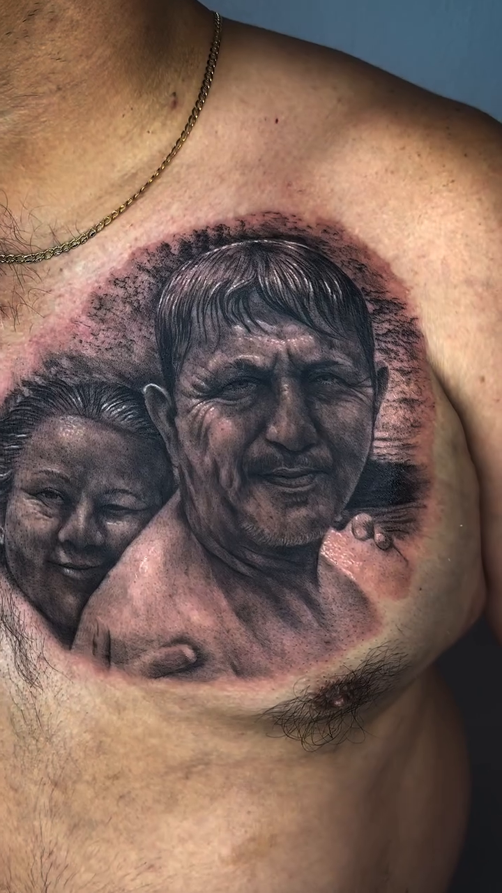 Tattoo by @elmertattoo1 — realism, black_and_grey