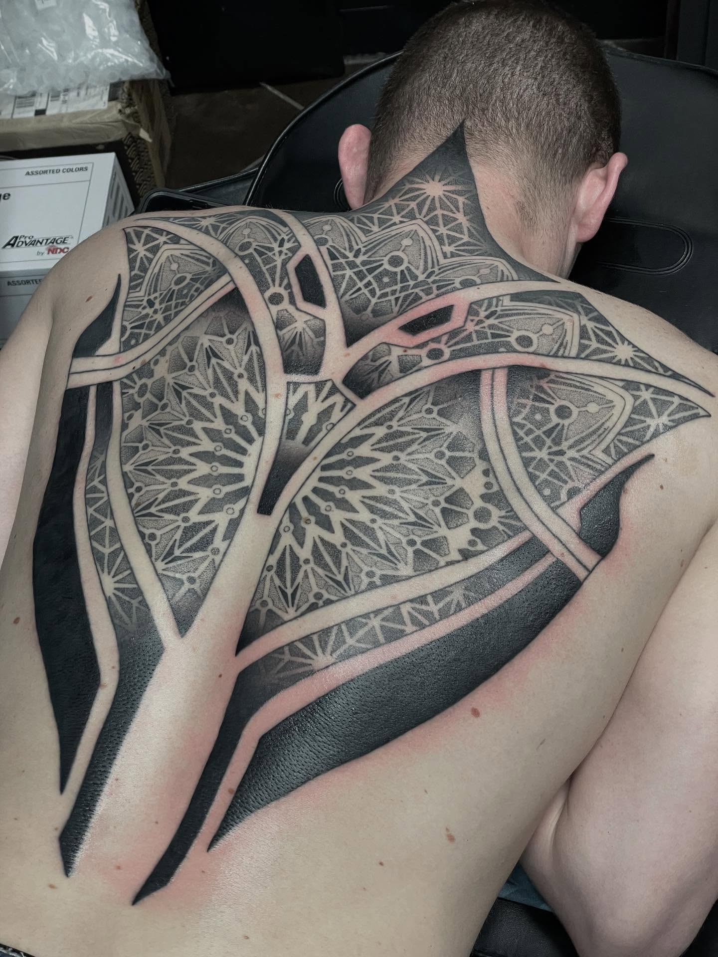 Geometric pattern geometric tattoo on the back by Jesse (Dreadzilla)